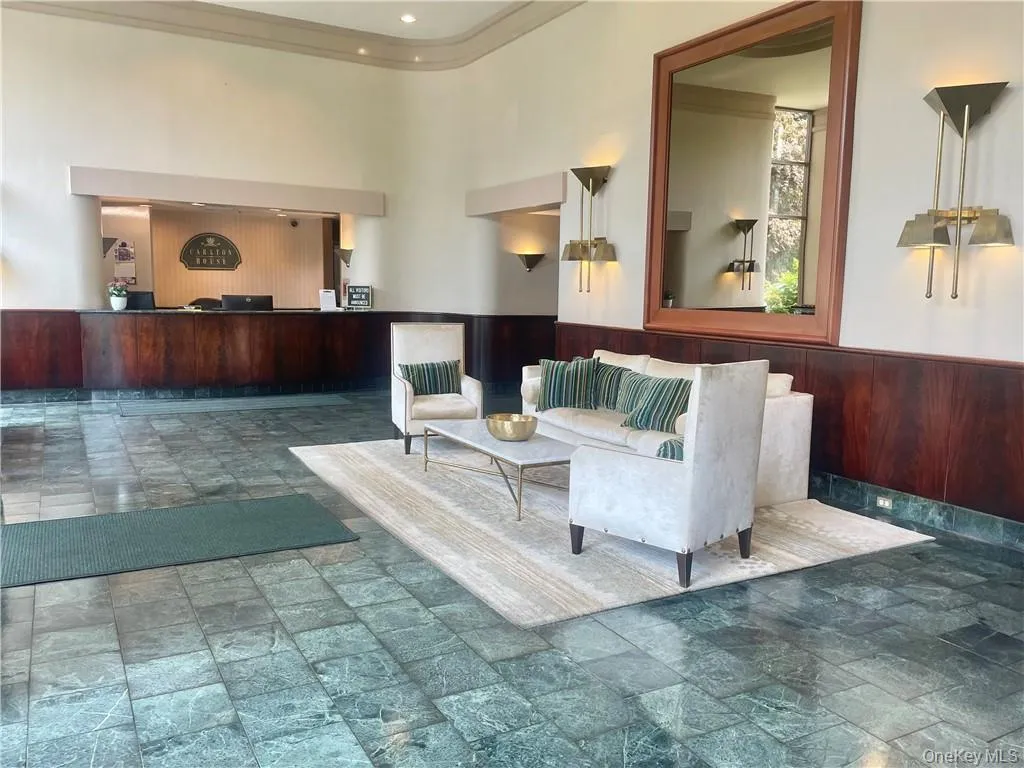 Lobby with concierge desk. Lobby with concierge desk.