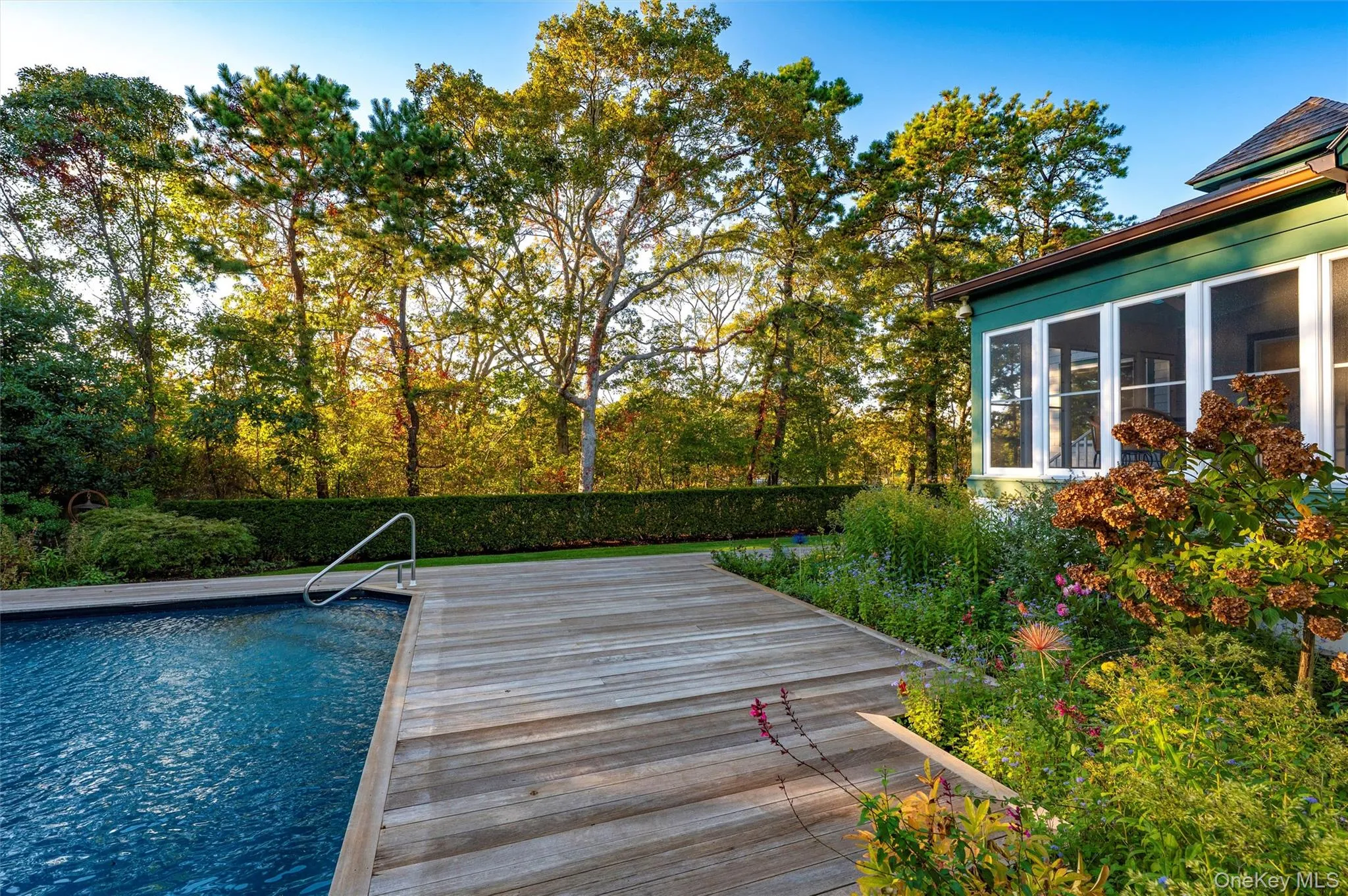 Swimming pool featuring a deck Swimming pool featuring a deck