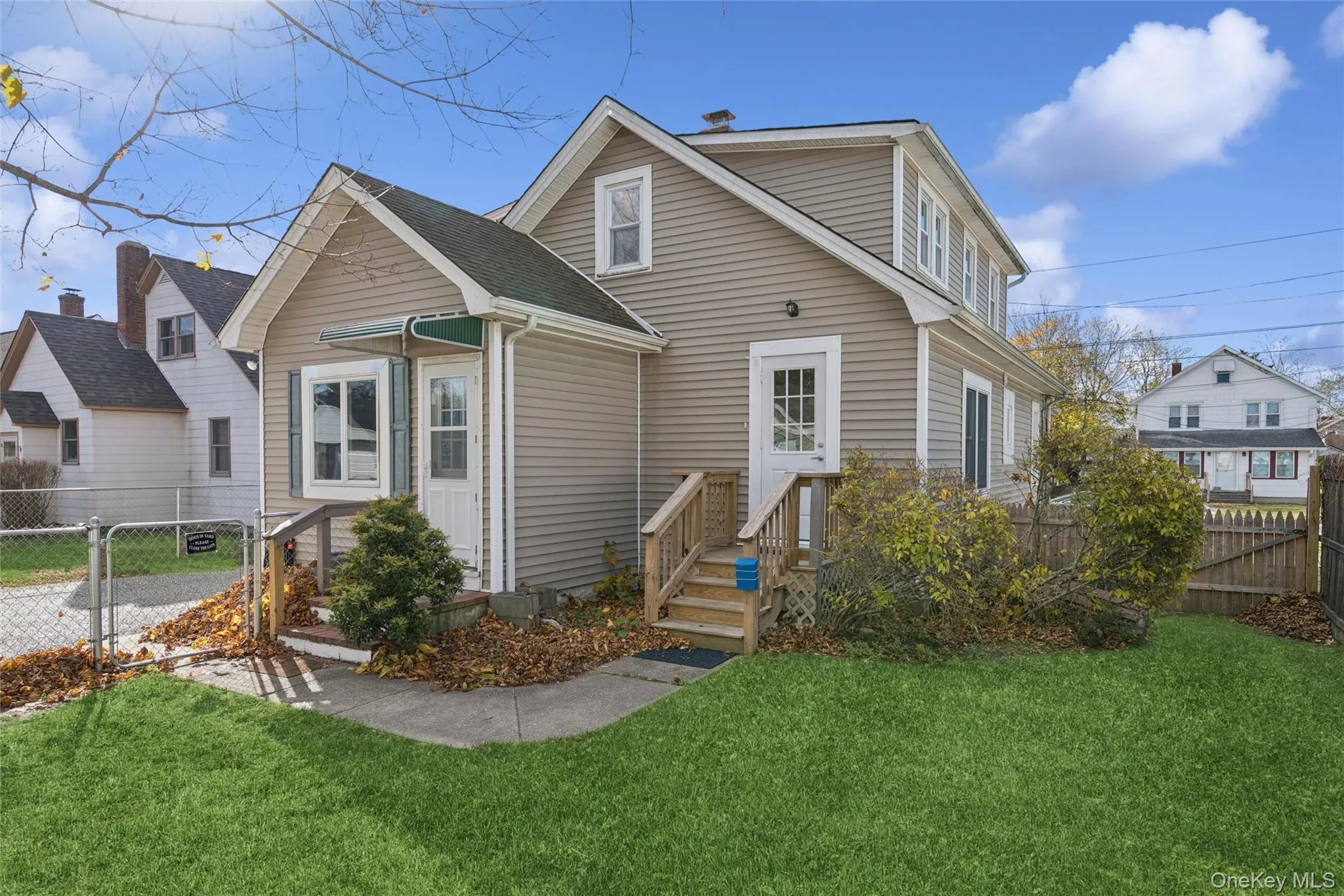 Rear view of property with a gate Rear view of property with a gate