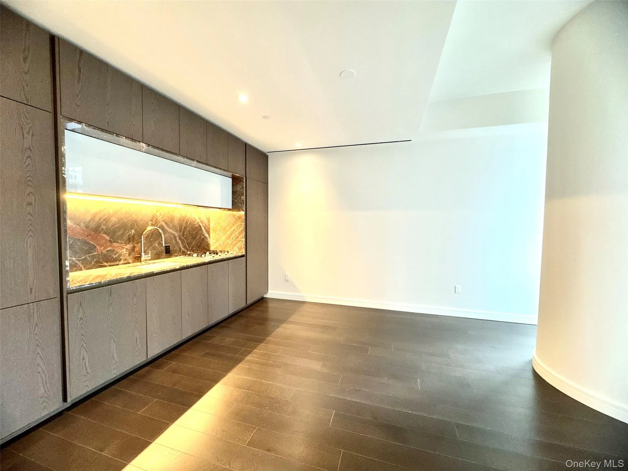 Cinema featuring dark wood-type flooring and baseboards Cinema featuring dark wood-type flooring and baseboards