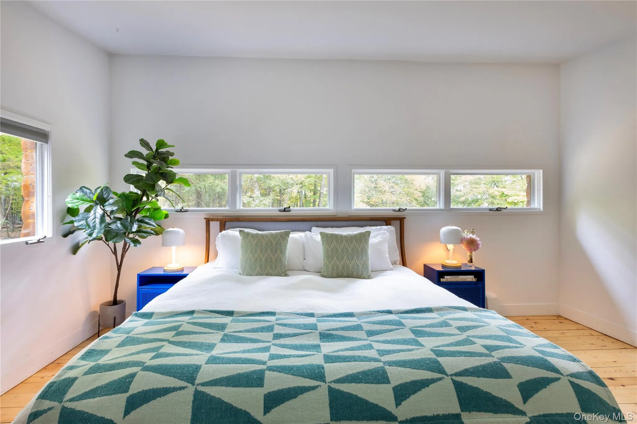 Bedroom featuring light wood-type flooring Bedroom featuring light wood-type flooring