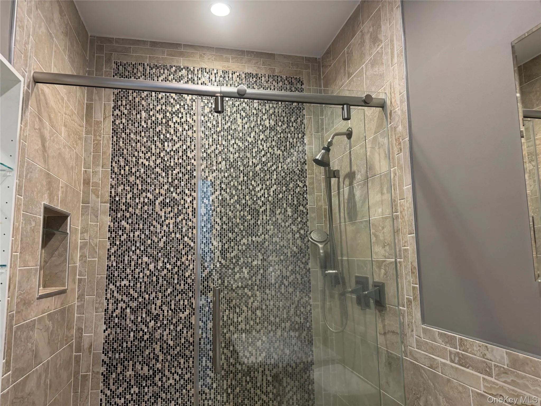 Full bath with a stall shower and recessed lighting Full bath with a stall shower and recessed lighting
