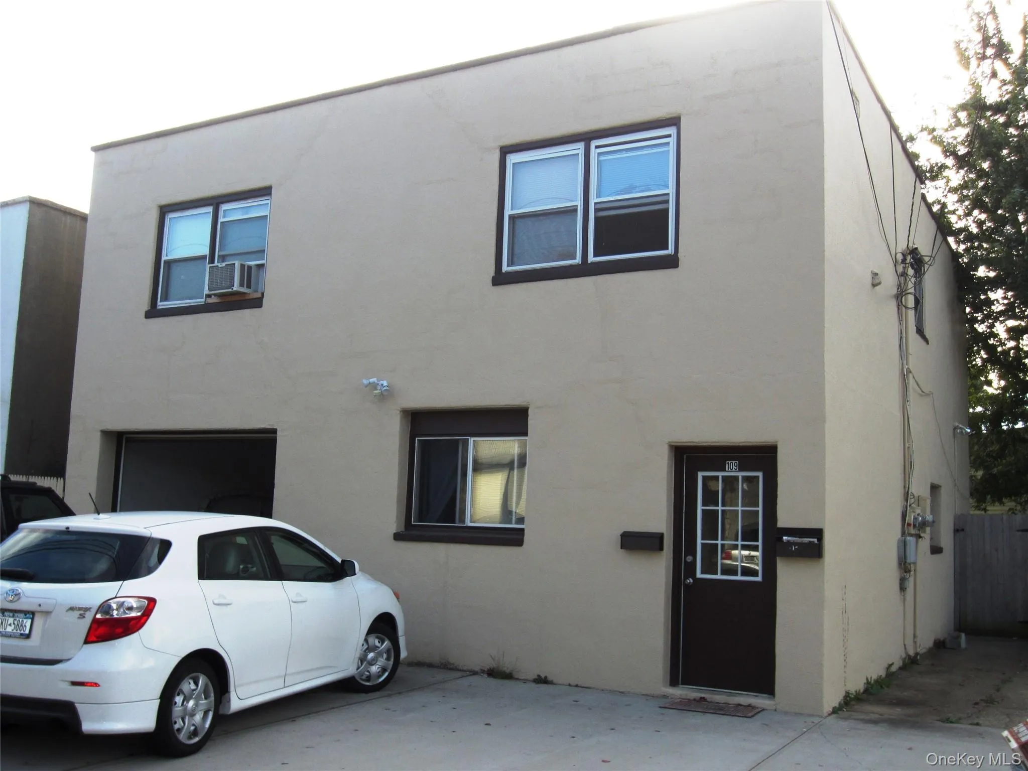 View of front of house with stucco siding View of front of house with stucco siding