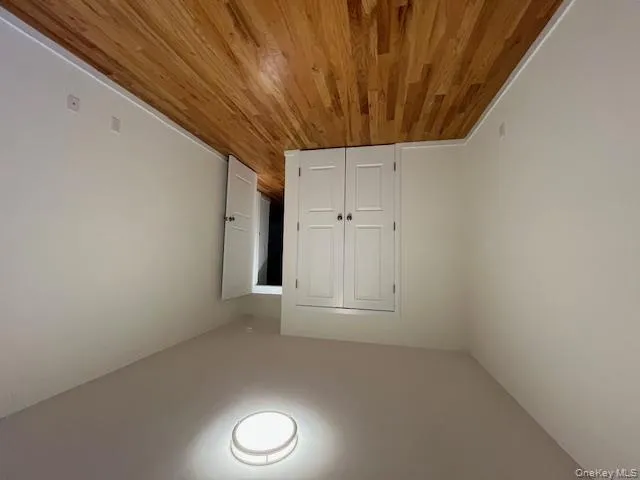 Bedroom 1 featuring wood finished floors and a closet Bedroom 1 featuring wood finished floors and a closet