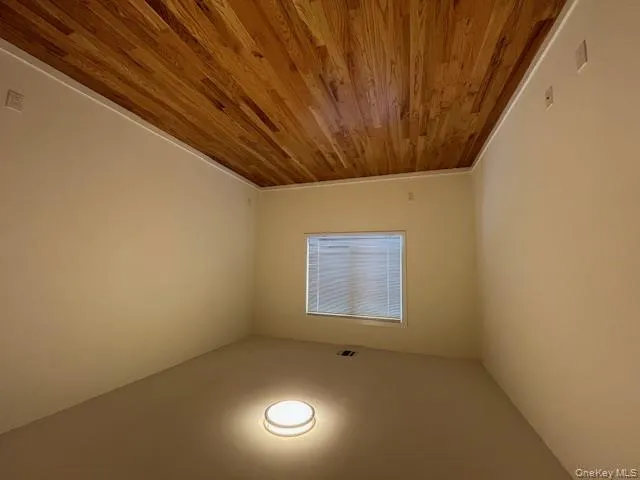Bedroom 1 featuring baseboards and light wood-style floors Bedroom 1 featuring baseboards and light wood-style floors