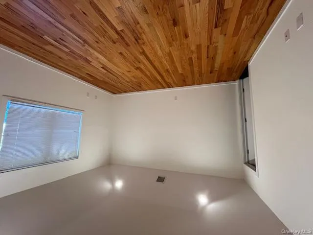 Bedroom 3 with light wood-type flooring and baseboards Bedroom 3 with light wood-type flooring and baseboards