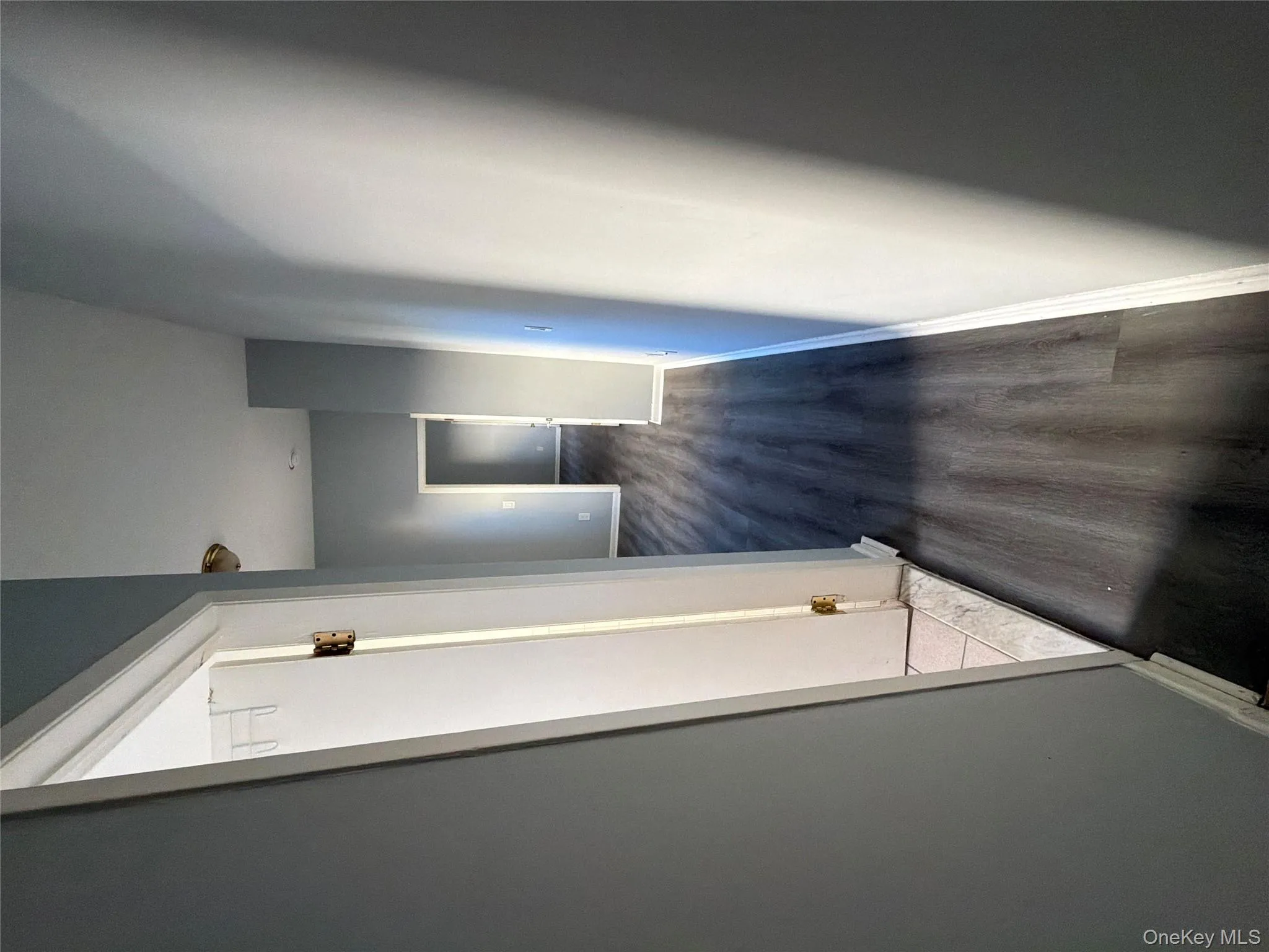 Hall with baseboards and dark wood-style floors Hall with baseboards and dark wood-style floors