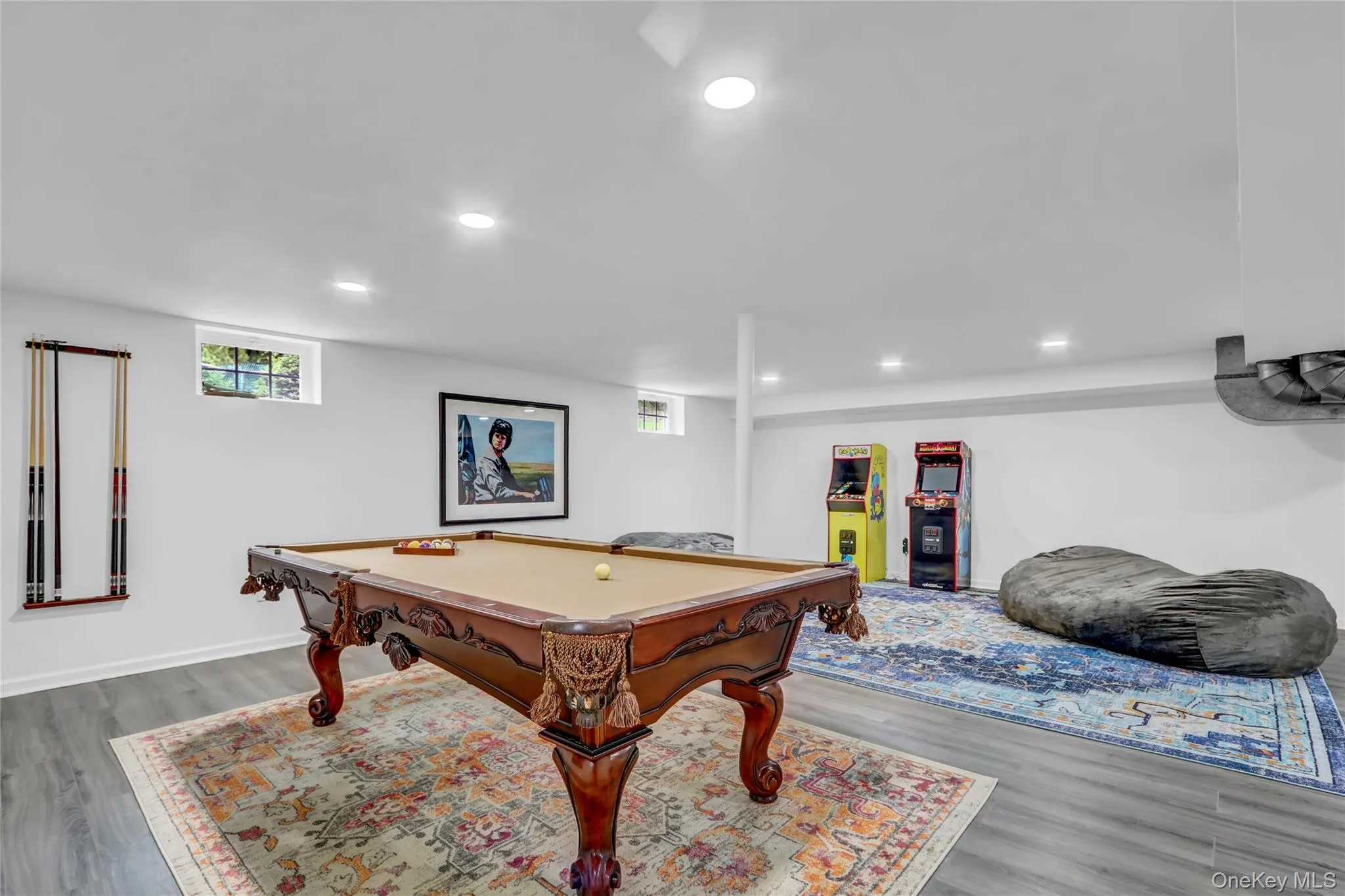 Recreation room featuring billiards, recessed lighting, and wood finished floors Recreation room featuring billiards, recessed lighting, and wood finished floors