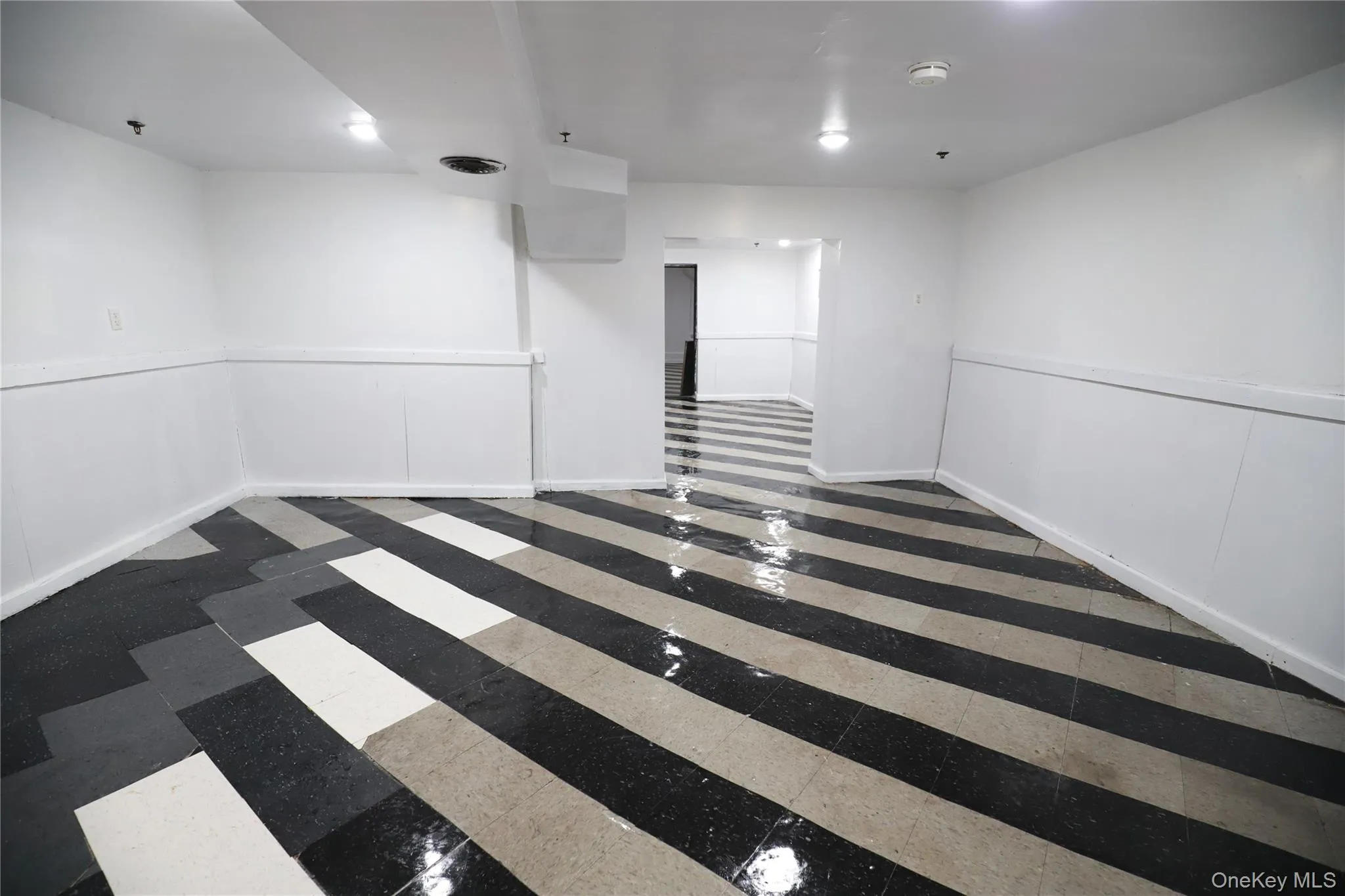 Empty room featuring baseboards Empty room featuring baseboards