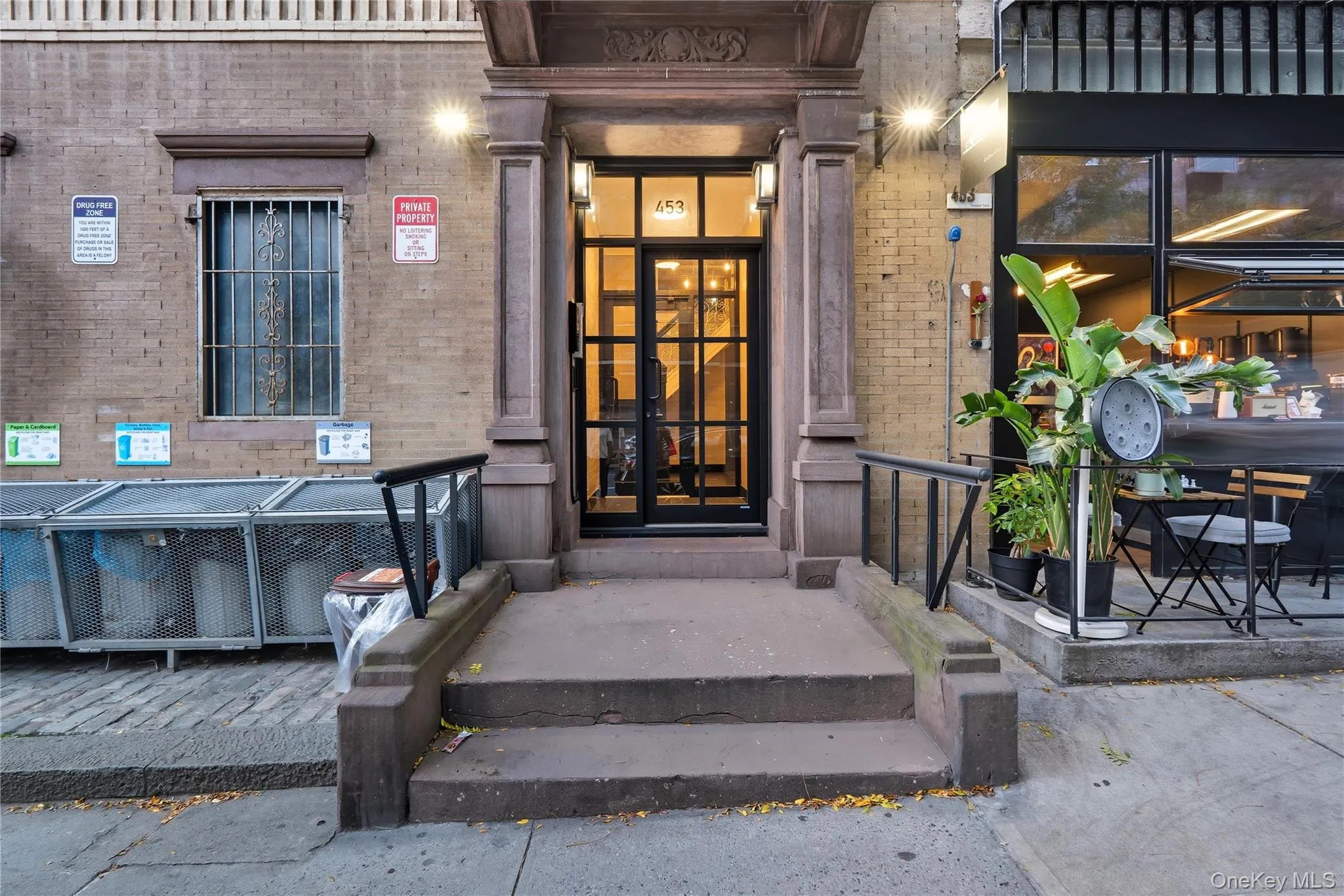 Property entrance with brick siding Property entrance with brick siding