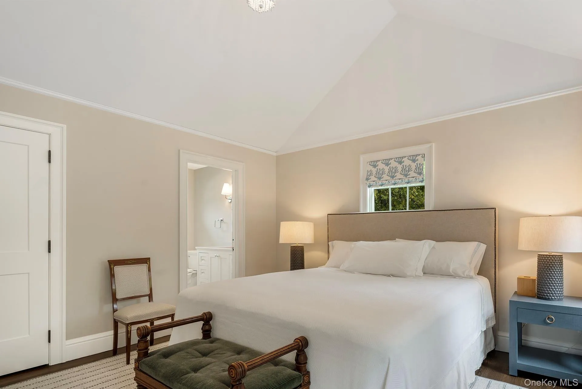 First Floor En Suite Bedroom with high vaulted ceiling, ensuite bathroom, and ornamental molding First Floor En Suite Bedroom with high vaulted ceiling, ensuite bathroom, and ornamental molding