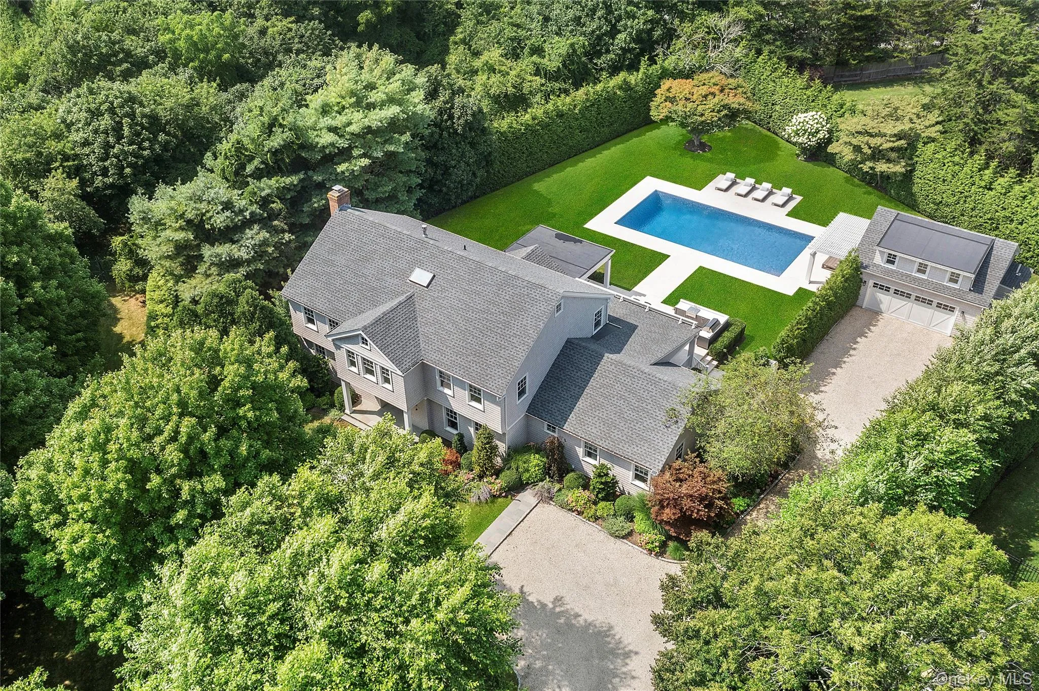 View of subject property with a pool area View of subject property with a pool area