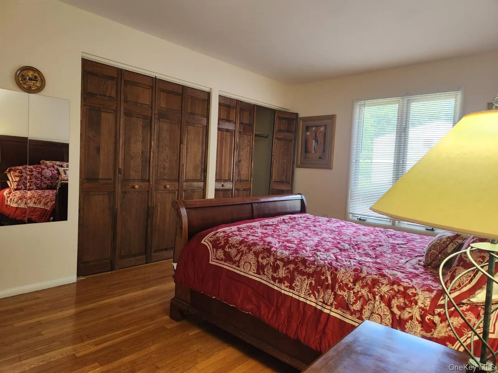 Bedroom with wood finished floors Bedroom with wood finished floors
