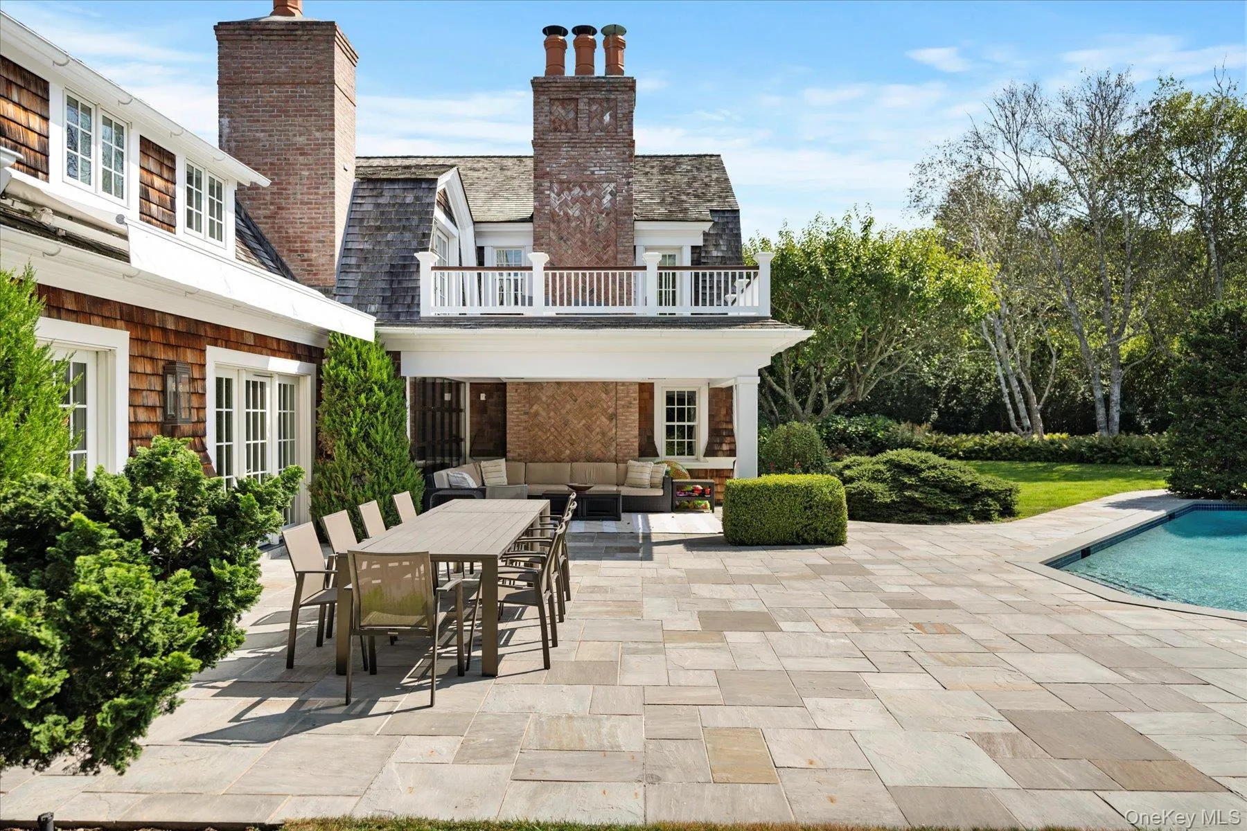 View of patio / terrace featuring an outdoor hangout area, outdoor dining area, and an outdoor pool View of patio / terrace featuring an outdoor hangout area, outdoor dining area, and an outdoor pool