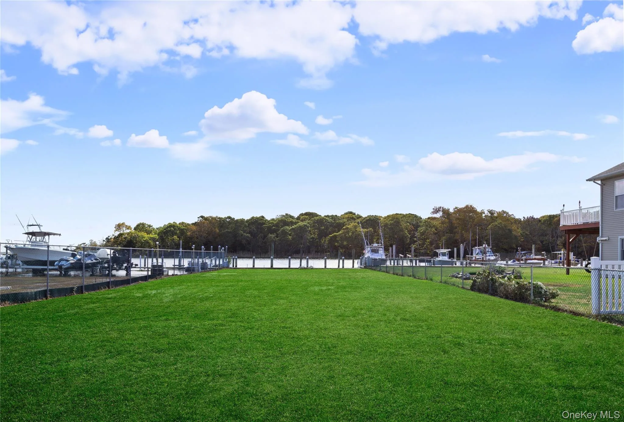 View of yard with a water view View of yard with a water view