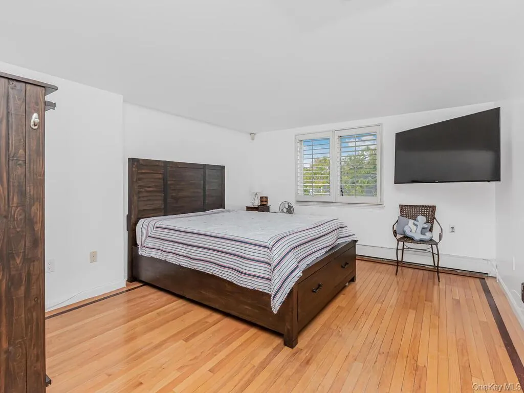 Spacious primary bedroom with walk-in closet and primary bathroom Spacious primary bedroom with walk-in closet and primary bathroom