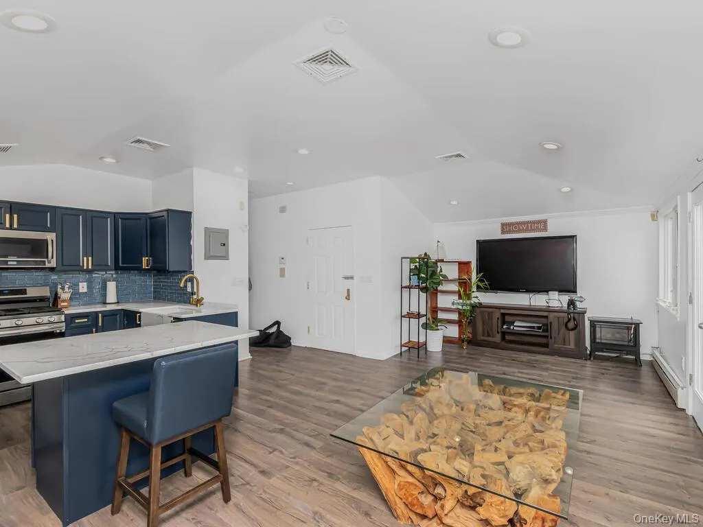 Open concept kitchen, living room and dining area Open concept kitchen, living room and dining area