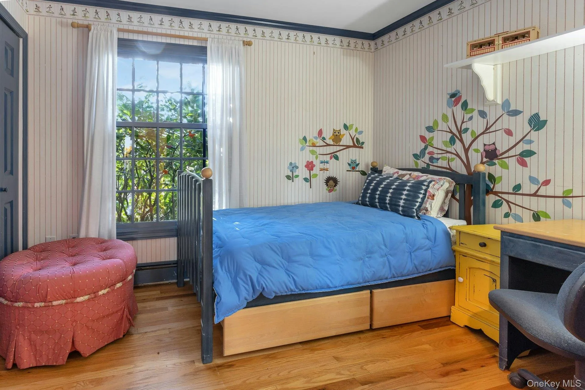 Bedroom with light wood-type flooring Bedroom with light wood-type flooring