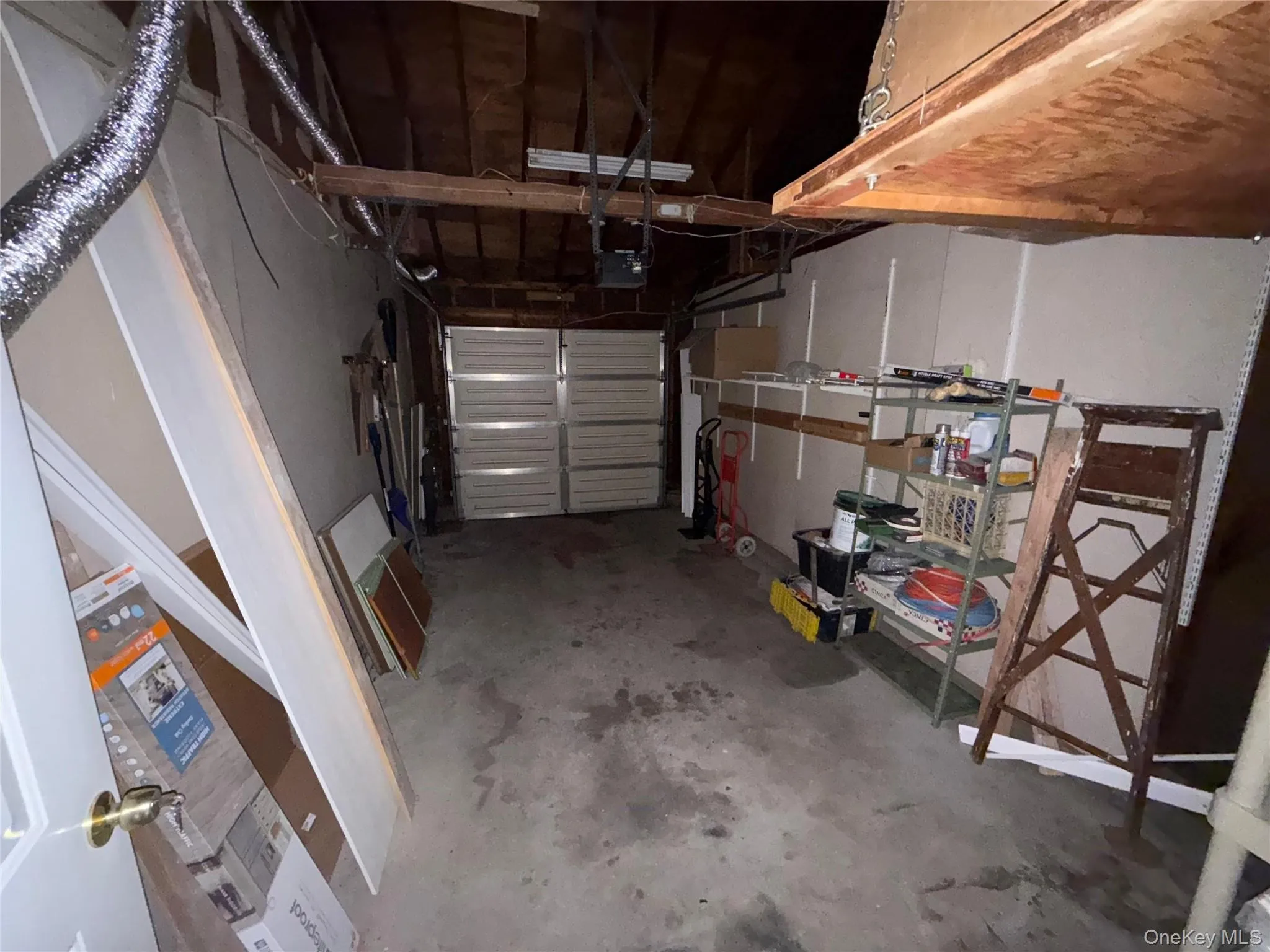 Garage with a garage door opener Garage with a garage door opener