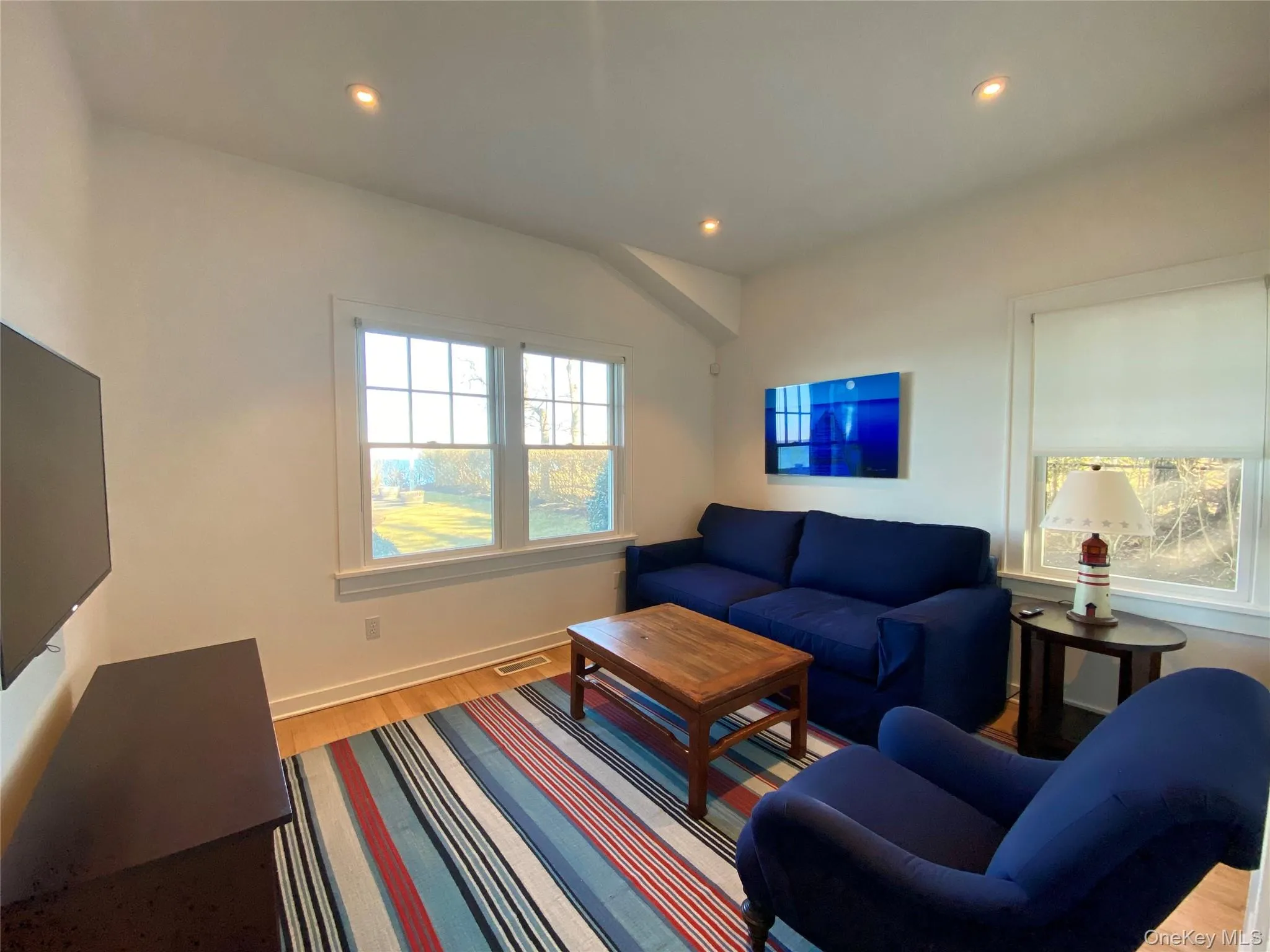 1st Floor Living room featuring light wood-style flooring and recessed lighting 1st Floor Living room featuring light wood-style flooring and recessed lighting