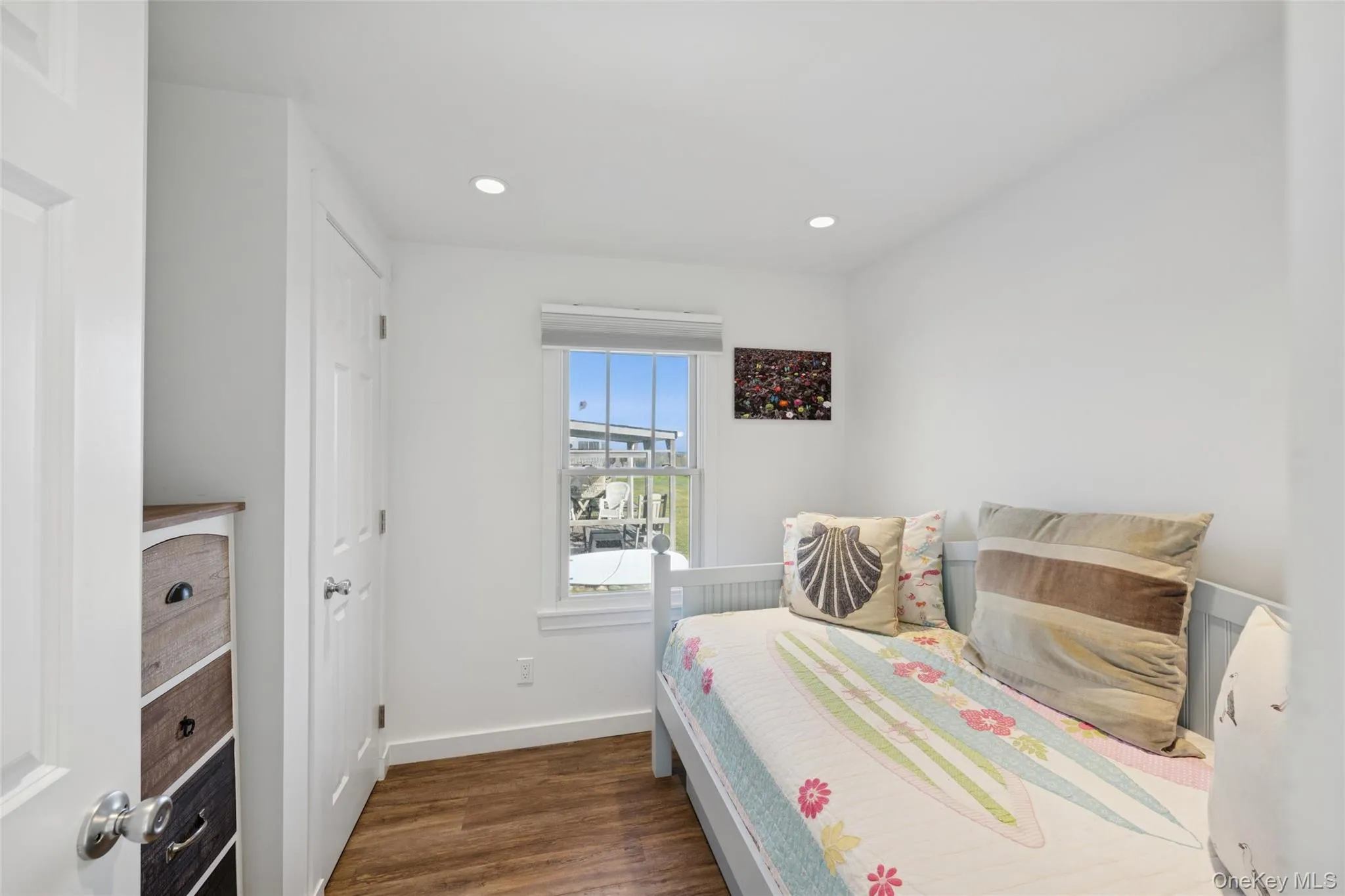 Bedroom featuring recessed lighting and dark wood-type flooring Bedroom featuring recessed lighting and dark wood-type flooring