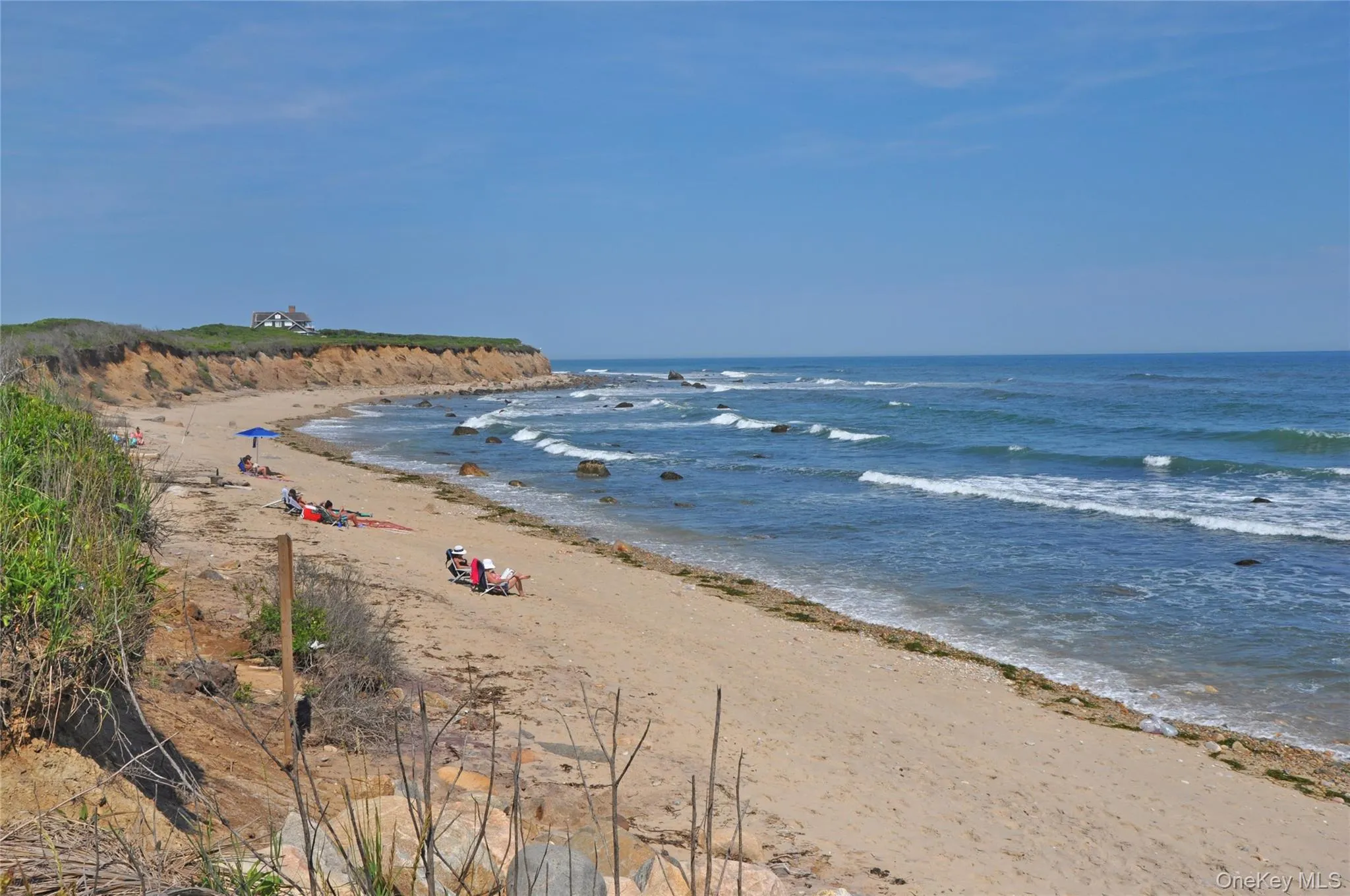 Water view featuring nearby beach Water view featuring nearby beach