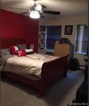Bedroom featuring ceiling fan Bedroom featuring ceiling fan