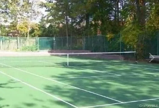View of tennis court View of tennis court