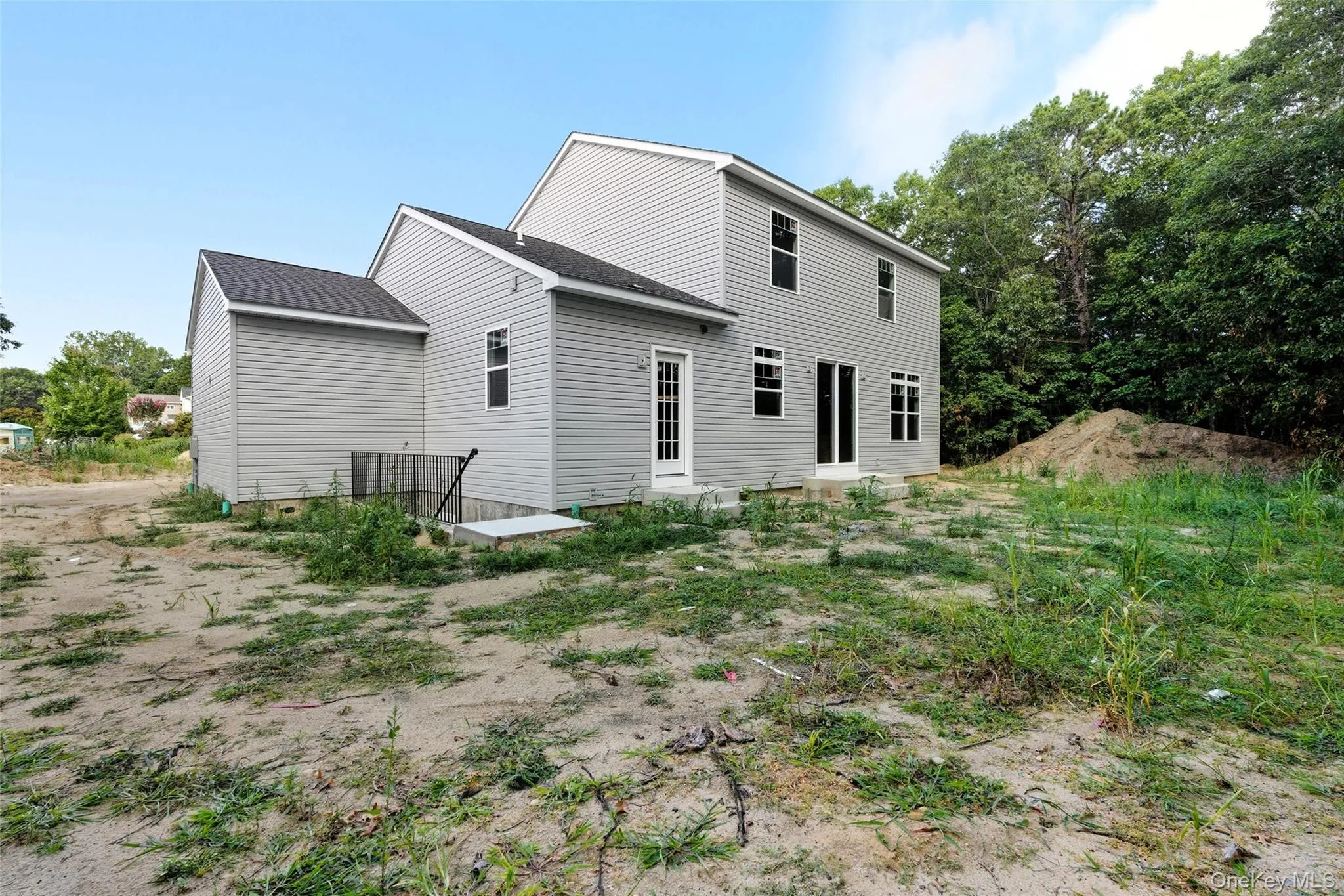 Rear view of property with roof with shingles Rear view of property with roof with shingles