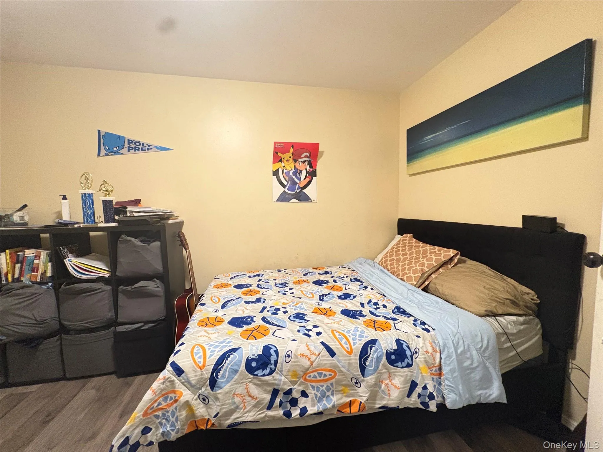 Bedroom with dark wood-style floors Bedroom with dark wood-style floors