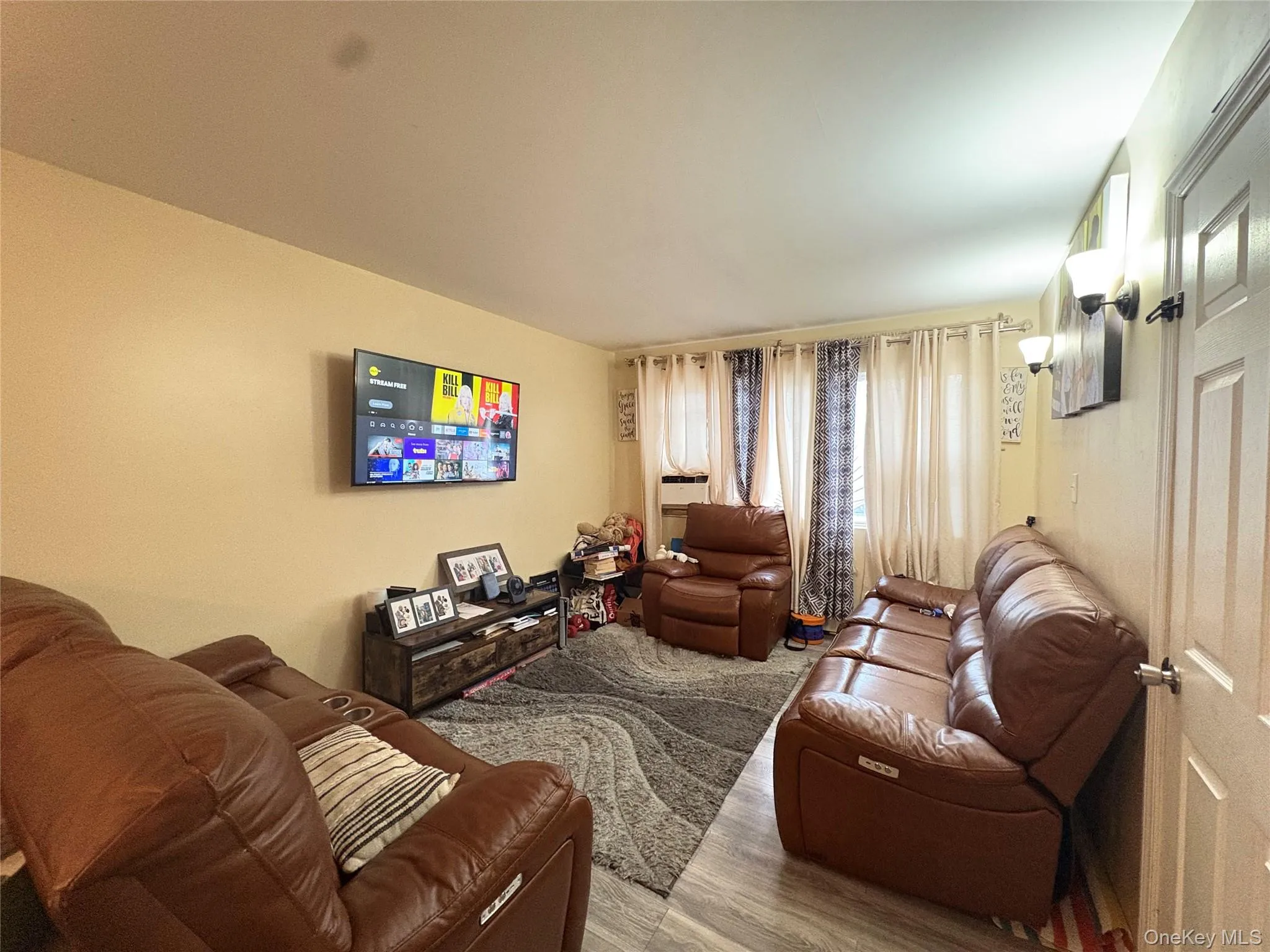 Living room with wood finished floors Living room with wood finished floors