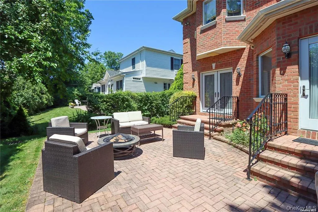 View of patio with an outdoor living space with a fire pit View of patio with an outdoor living space with a fire pit