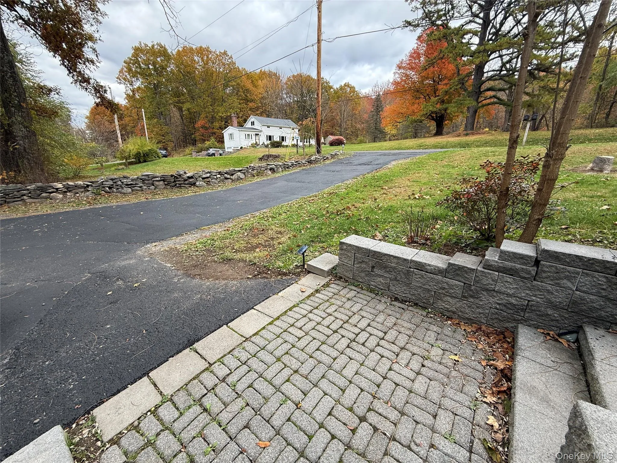 View of asphalt driveway View of asphalt driveway