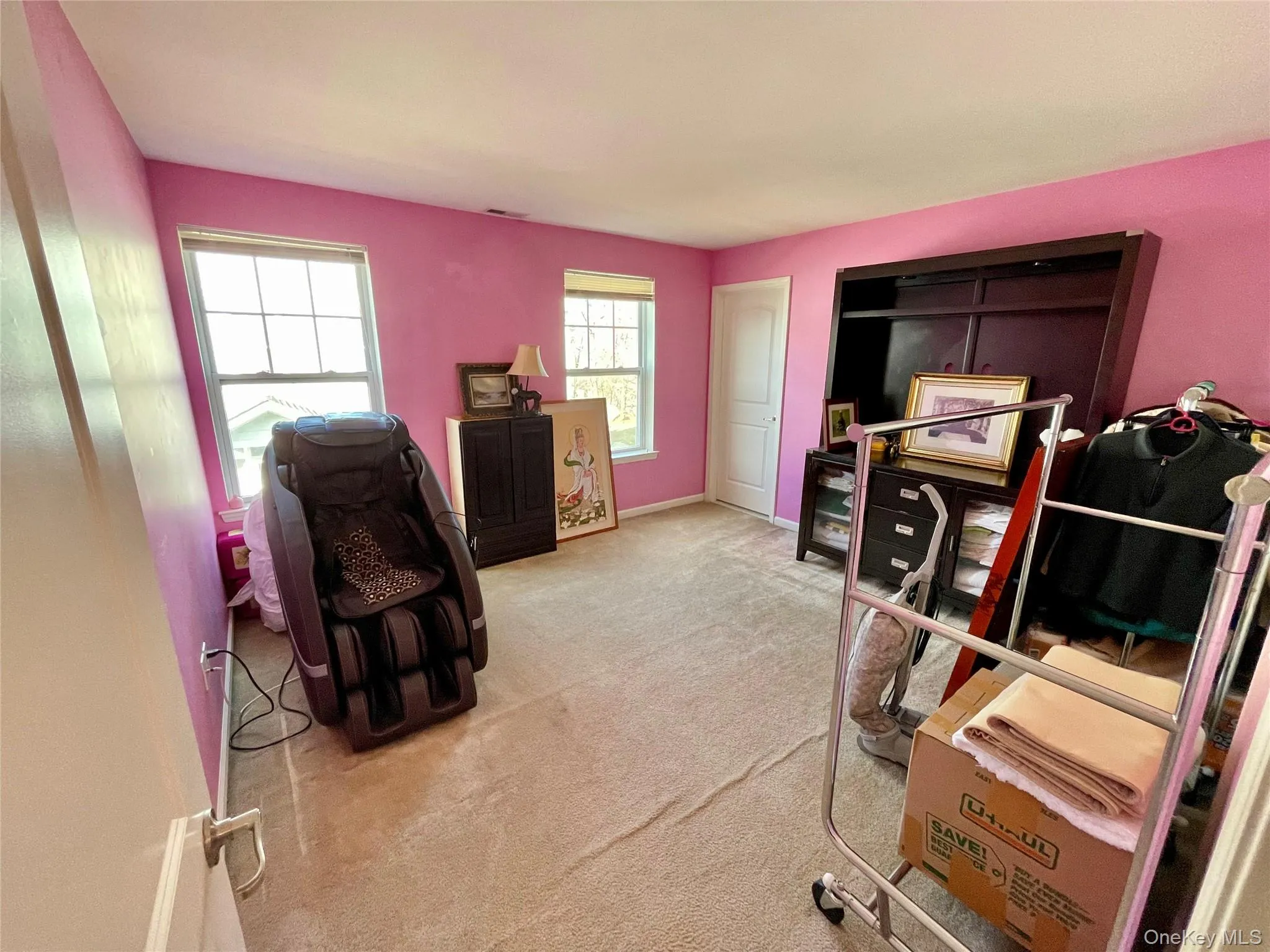 Carpeted office featuring baseboards Carpeted office featuring baseboards