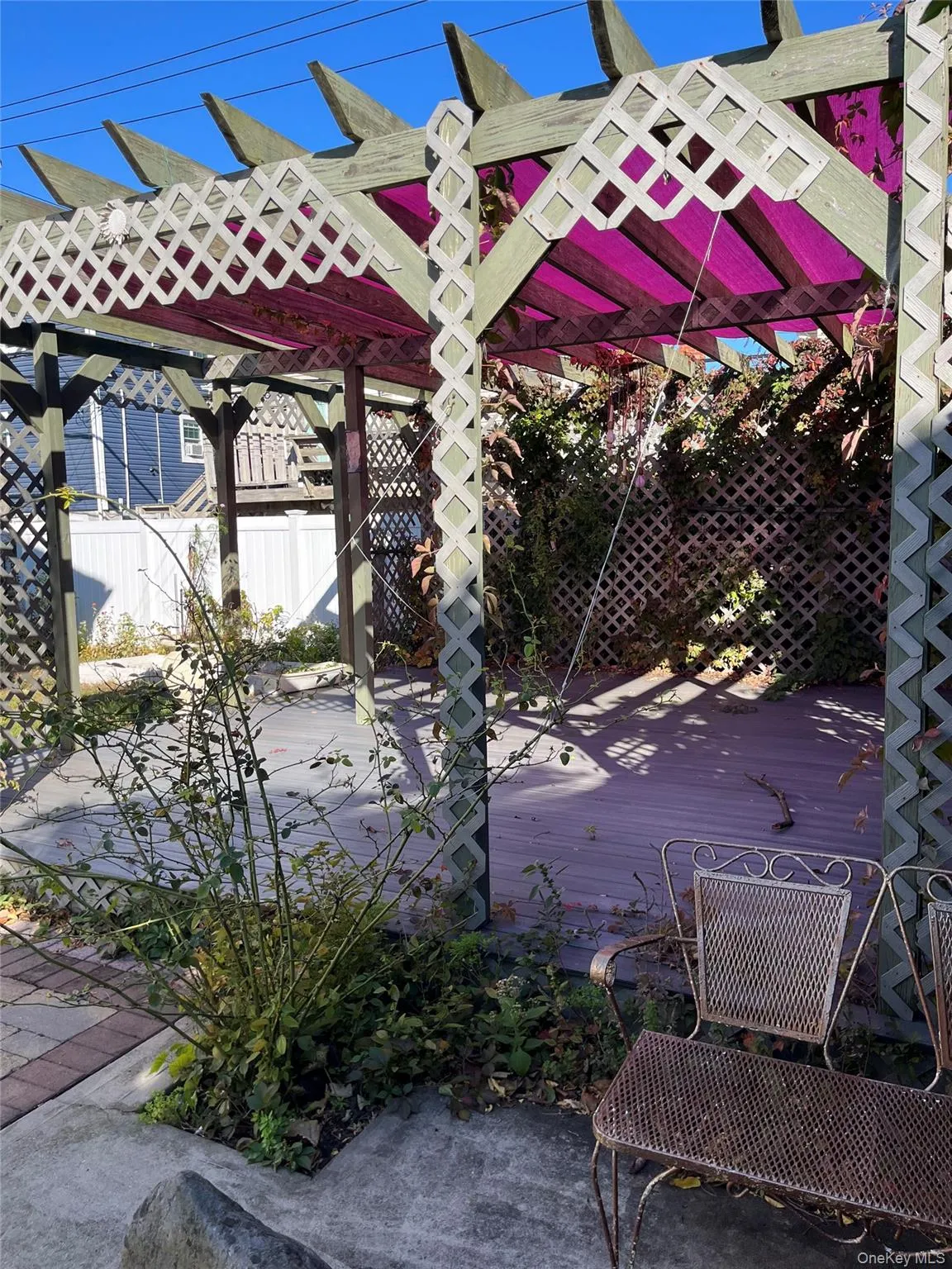 View of patio / terrace featuring a pergola and a wooden deck View of patio / terrace featuring a pergola and a wooden deck