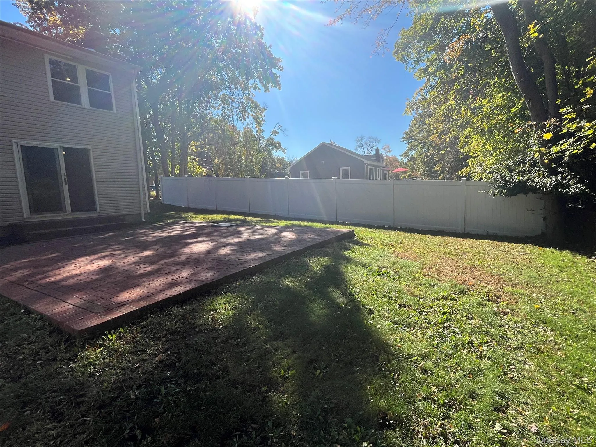 View of yard featuring a patio area View of yard featuring a patio area