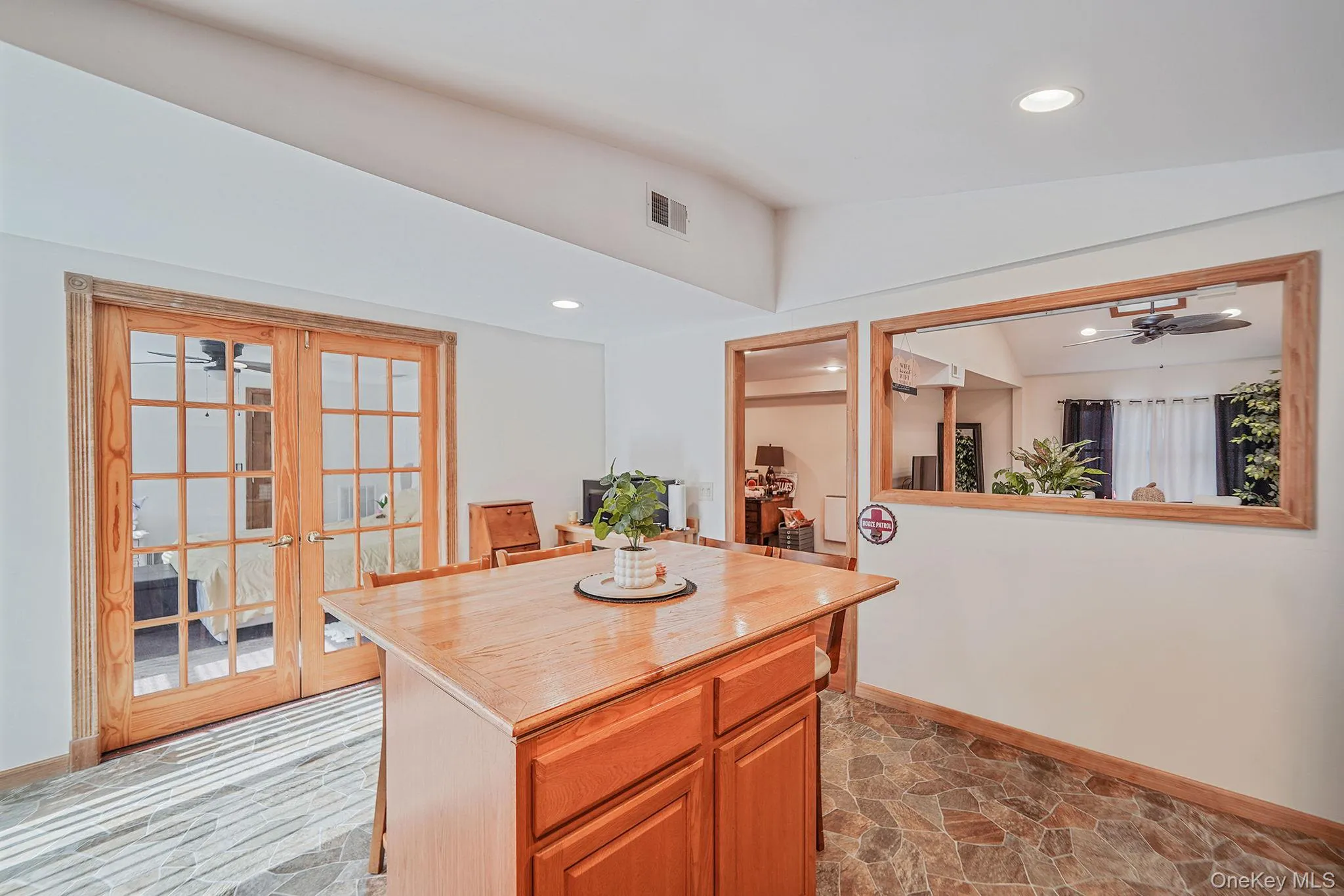 EIK with Ample Cabinetry/Countertop, Large Center Island with Storage and Room for Multiple Stools, SS Fridge/Stove, Dishwasher and Microwave EIK with Ample Cabinetry/Countertop, Large Center Island with Storage and Room for Multiple Stools, SS Fridge/Stove, Dishwasher and Microwave