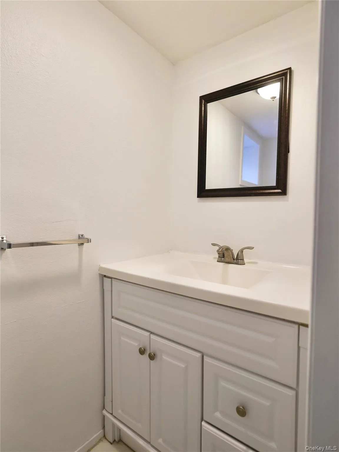 Bathroom featuring vanity Bathroom featuring vanity