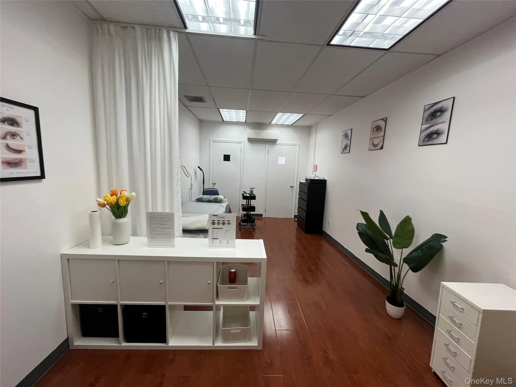 Office space with a paneled ceiling Office space with a paneled ceiling