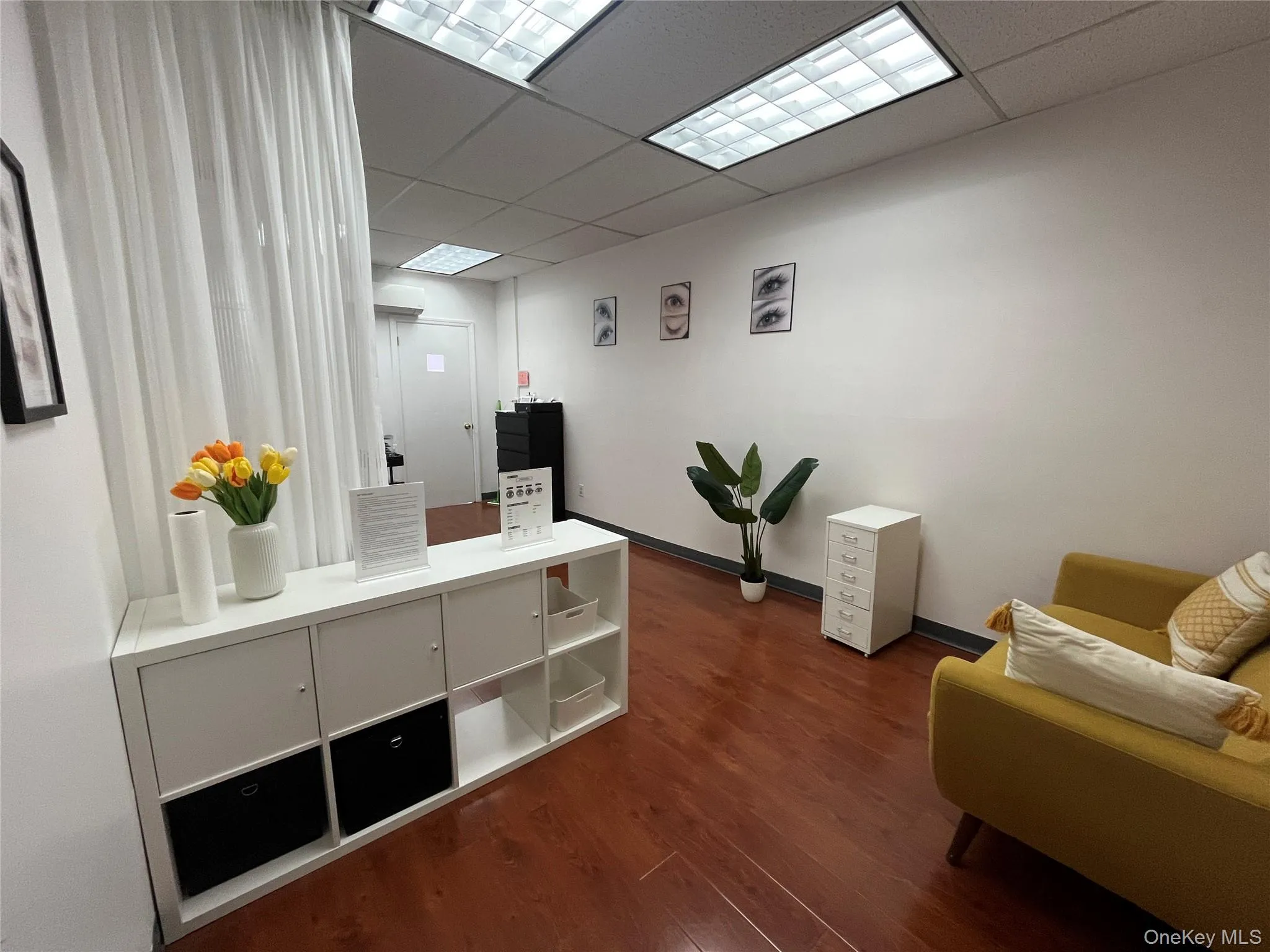 Office space with a drop ceiling Office space with a drop ceiling