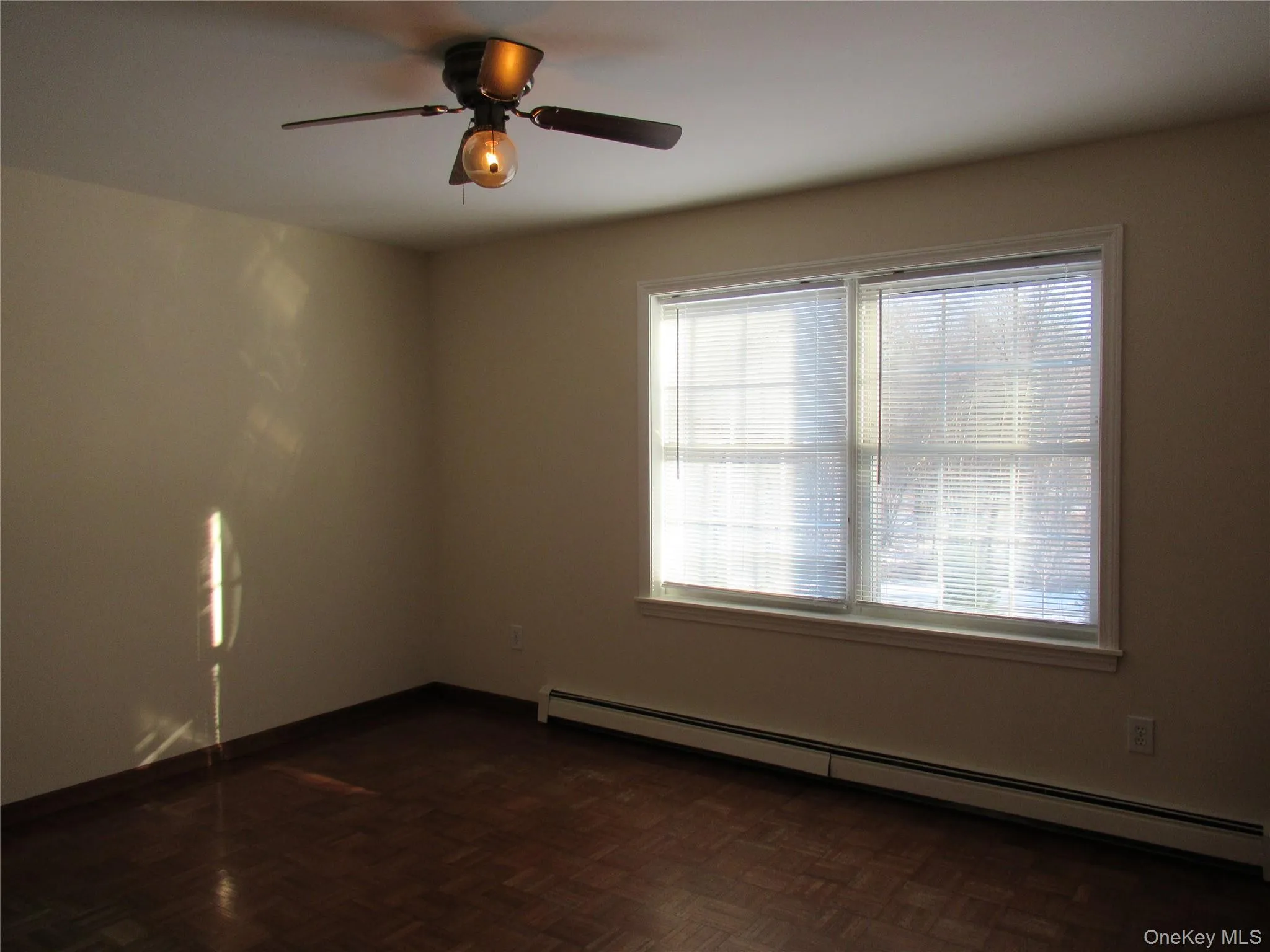 Main Bedroom with ceiling fan and parquet floor Main Bedroom with ceiling fan and parquet floor
