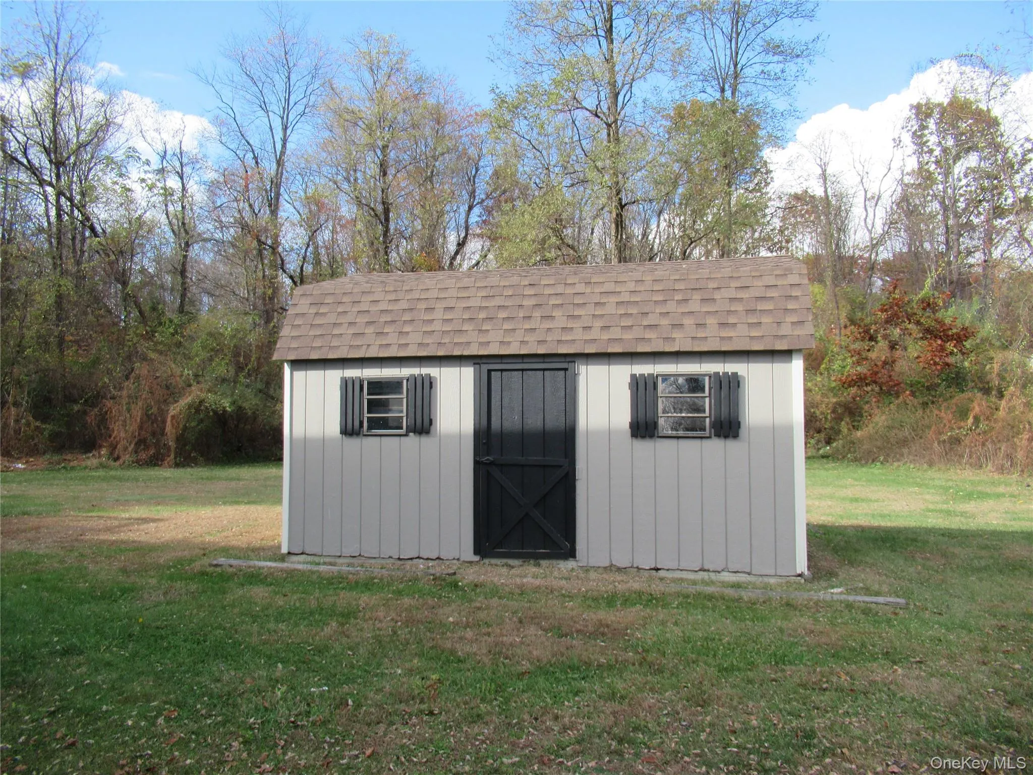 Shed with additional storage space Shed with additional storage space