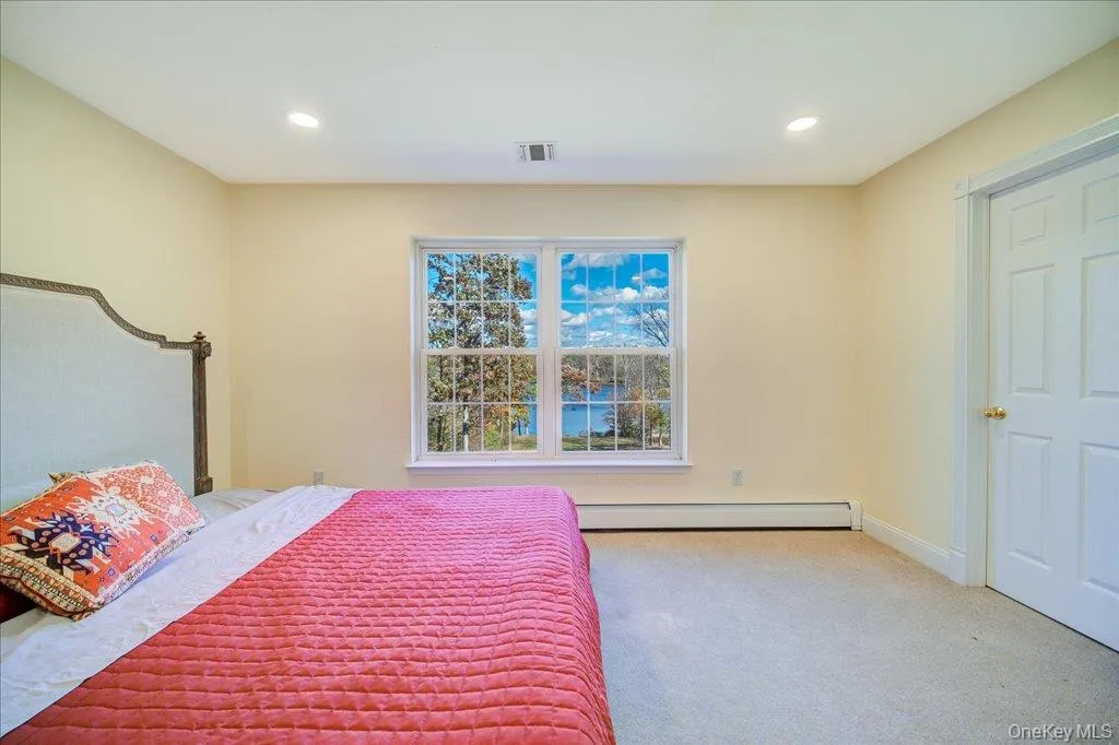 Lakeview Bedroom with carpet flooring, recessed lighting, and a baseboard radiator Lakeview Bedroom with carpet flooring, recessed lighting, and a baseboard radiator