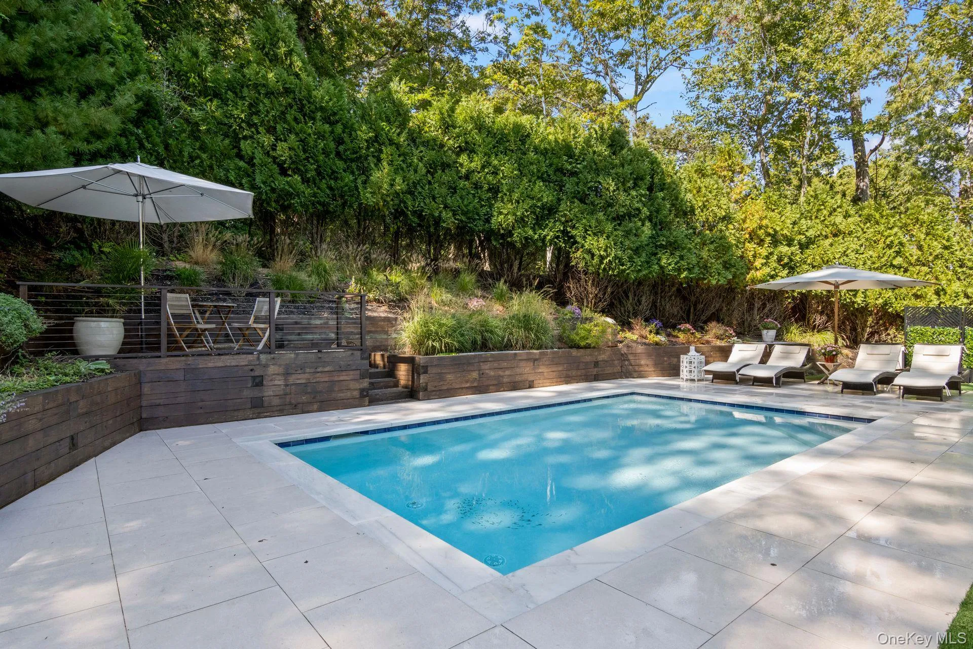 View of pool with a patio View of pool with a patio