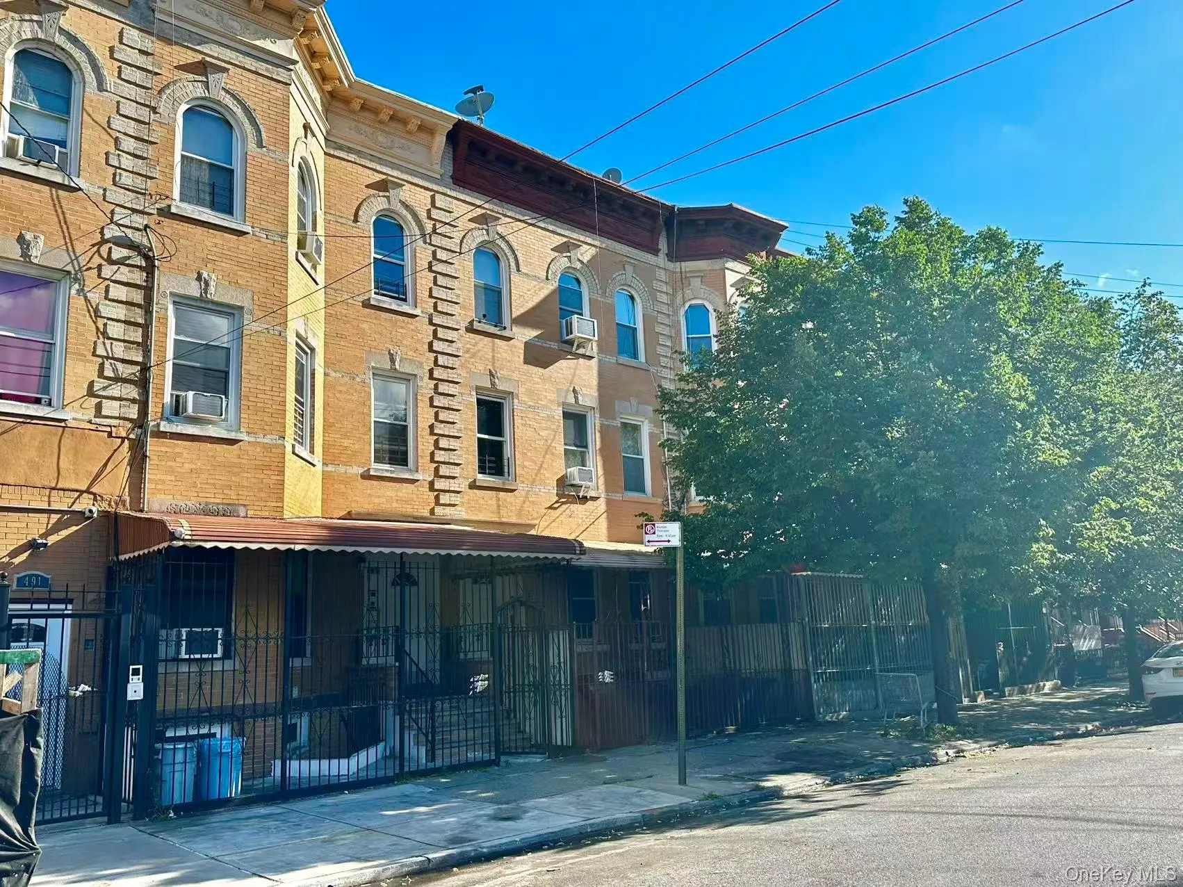 View of building exterior featuring cooling unit View of building exterior featuring cooling unit