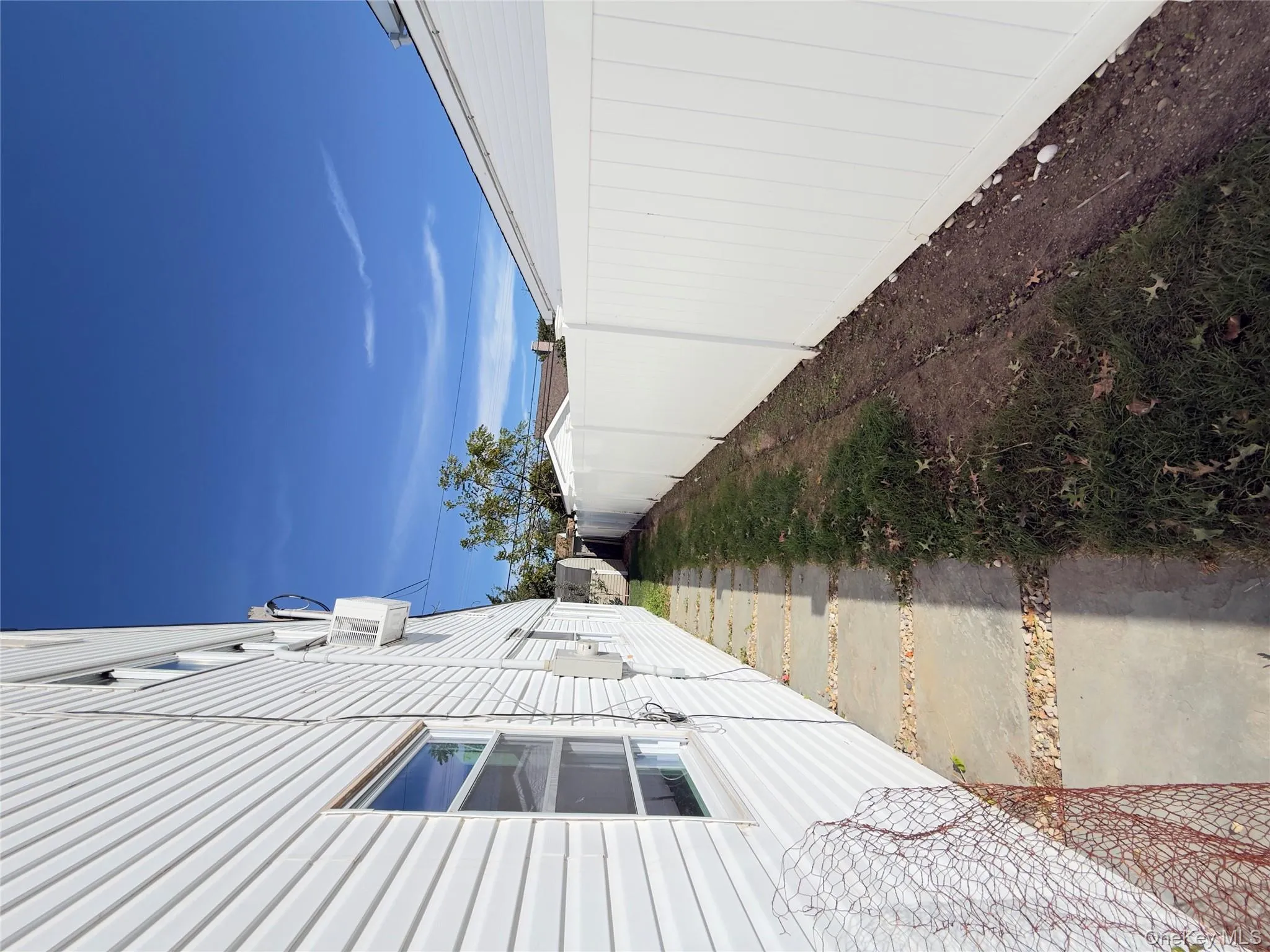 View of yard with cooling unit View of yard with cooling unit