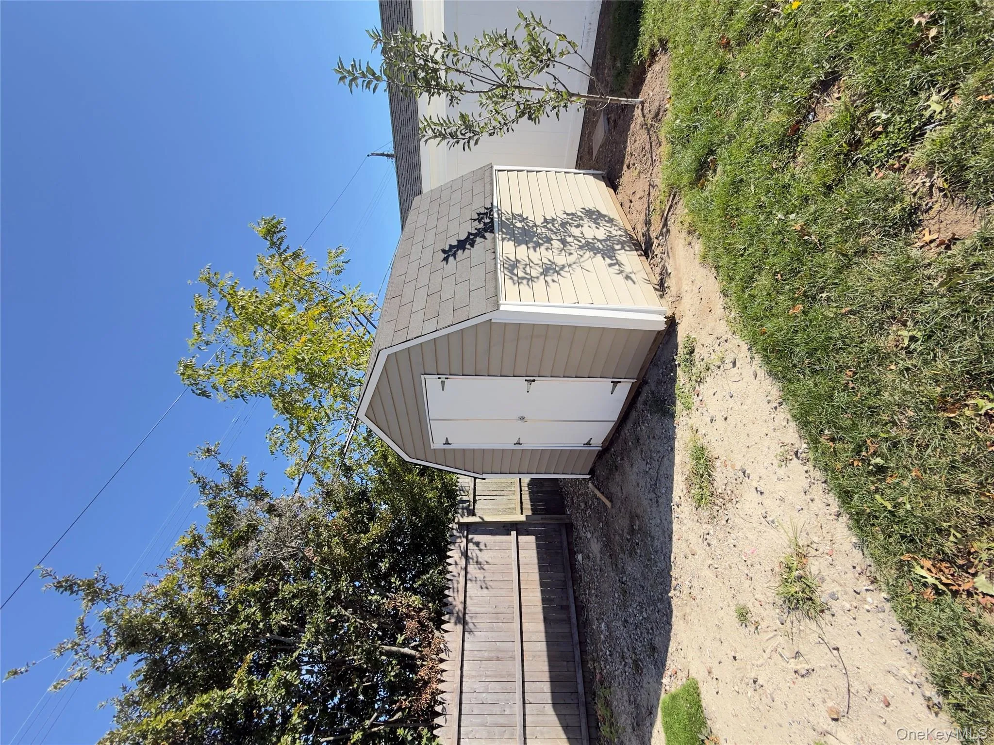 View of shed with a fenced backyard View of shed with a fenced backyard
