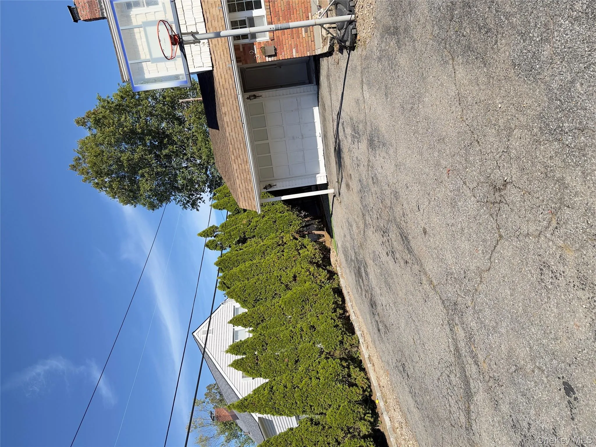 Garage featuring driveway Garage featuring driveway
