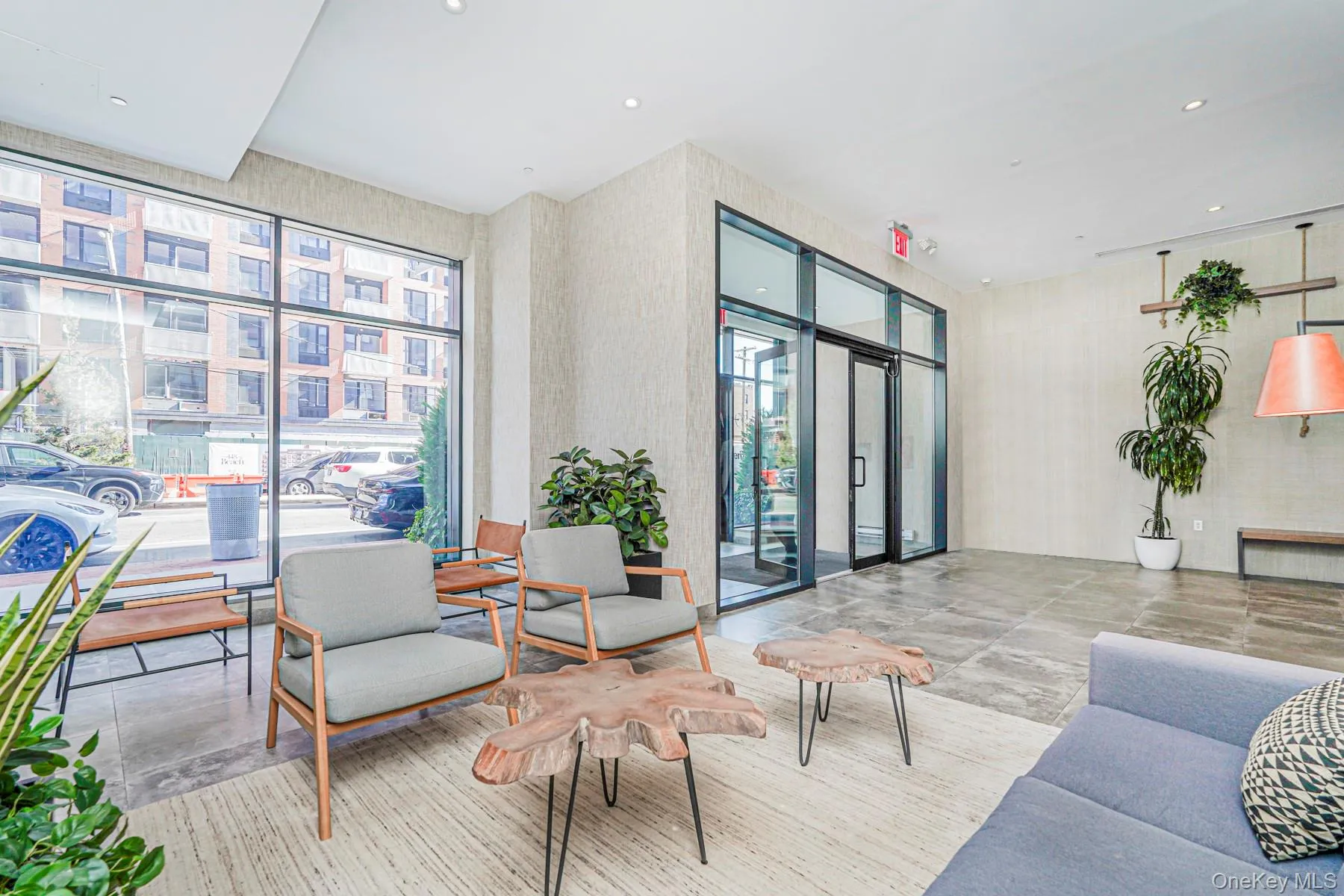 Building lobby featuring recessed lighting Building lobby featuring recessed lighting