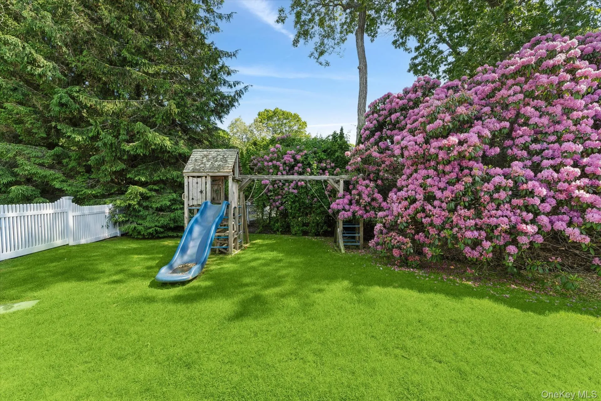 View of yard featuring a playground View of yard featuring a playground